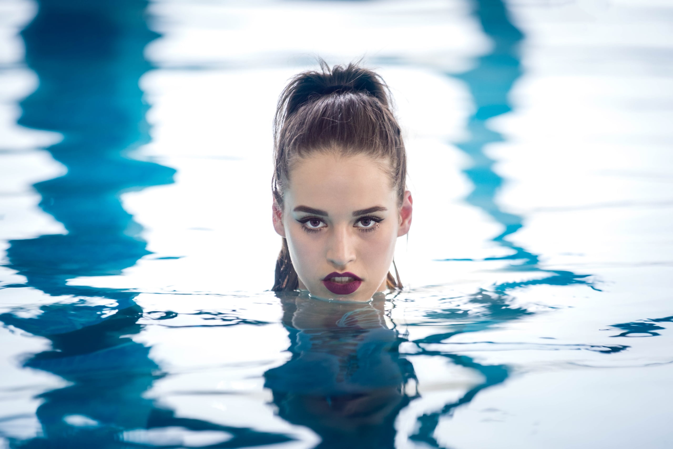 water, swimming pool, face, women, portrait, one person, looking at camera