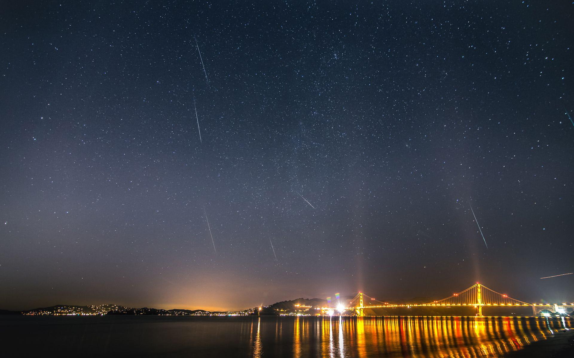 Shooting stars over Golden Gate Bridge, meteor shower, world