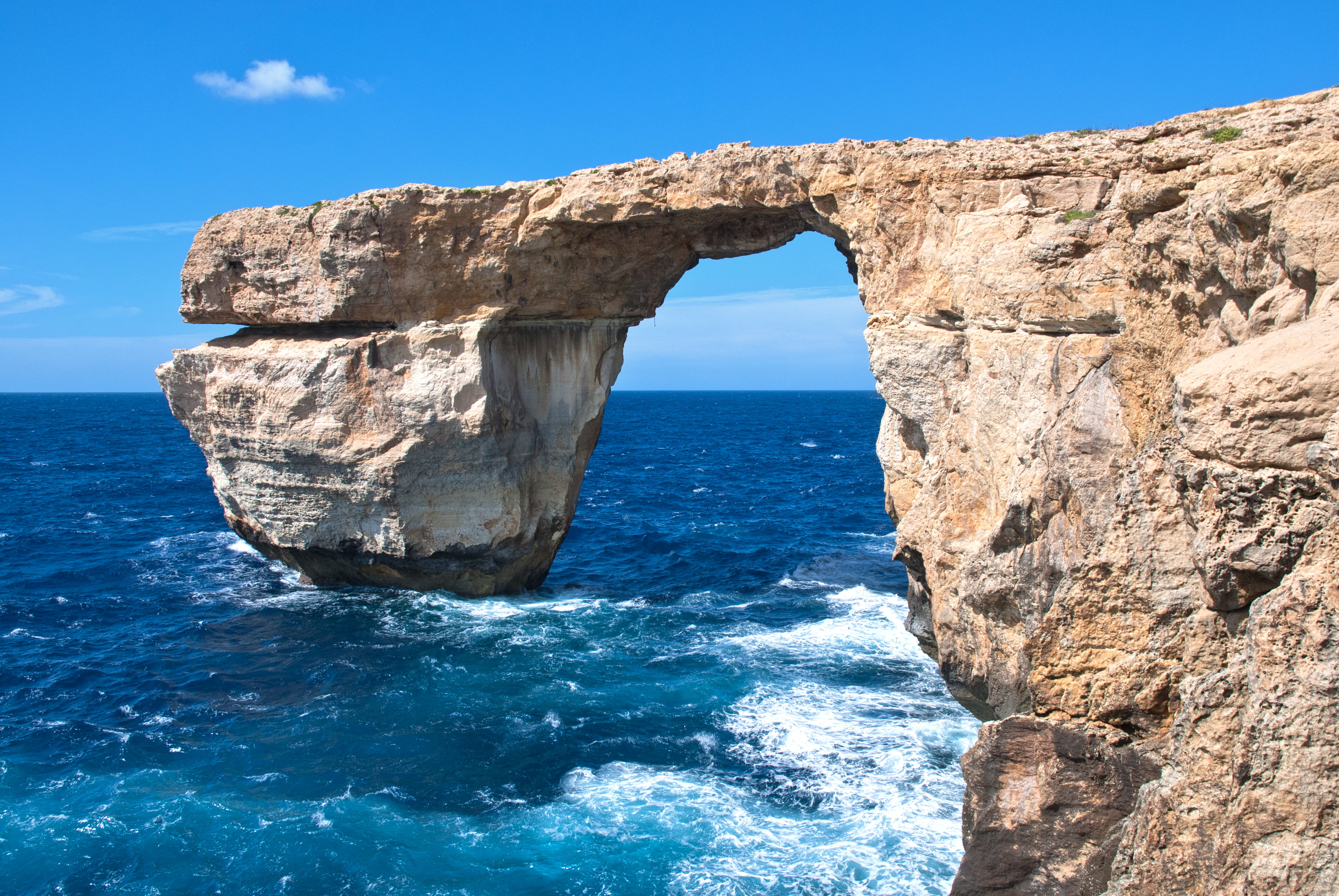 brown rock formation on body of water during day time, malta, gozo, malta, gozo