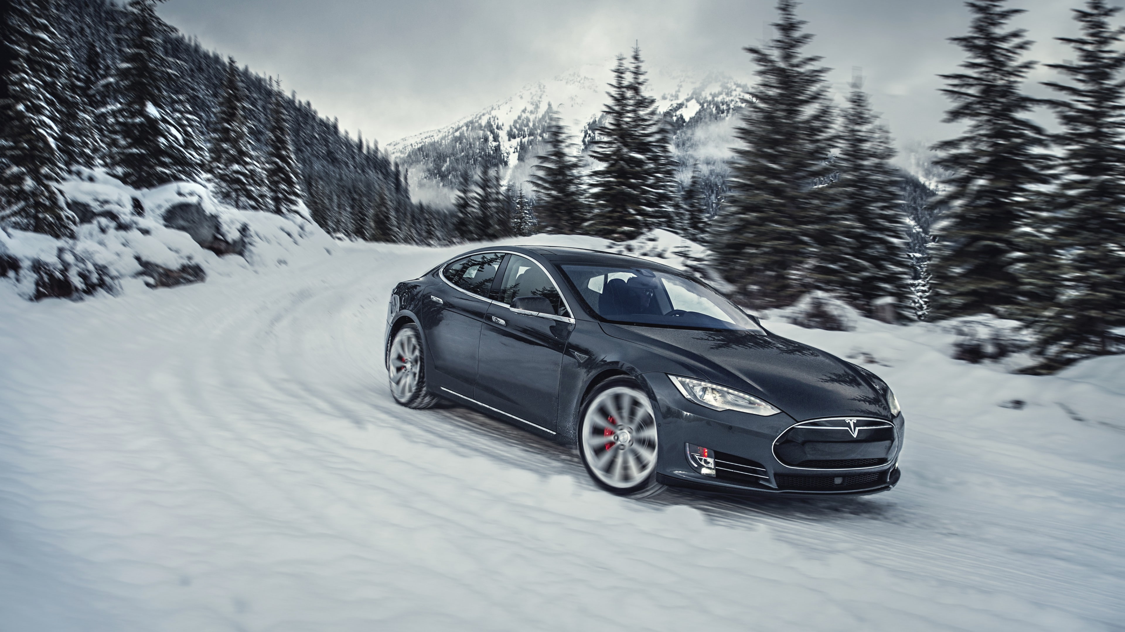 black car on snow filled road at daytime, Tesla model S P85D
