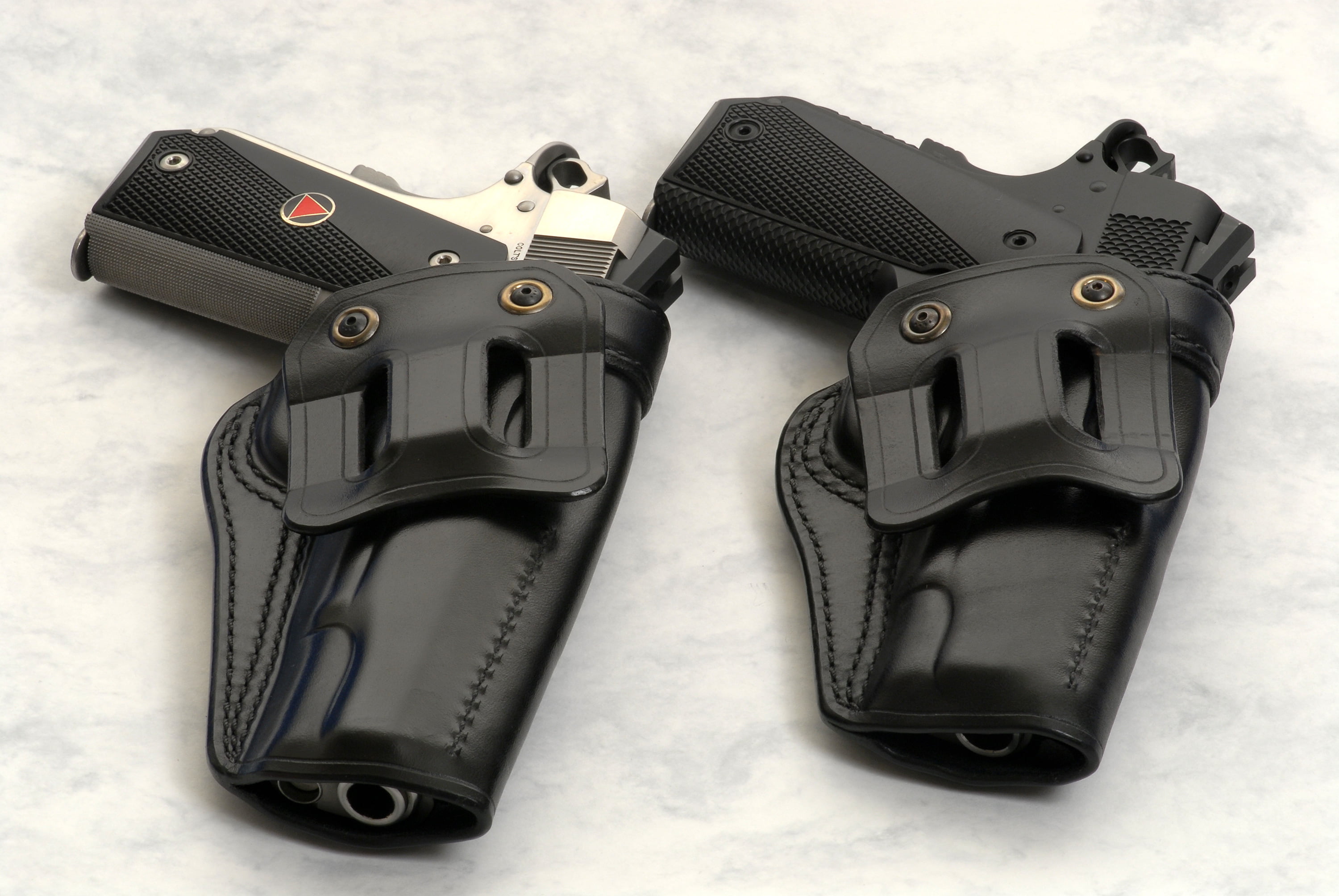 two black semi-automatic pistols and two holsters, Wallpaper
