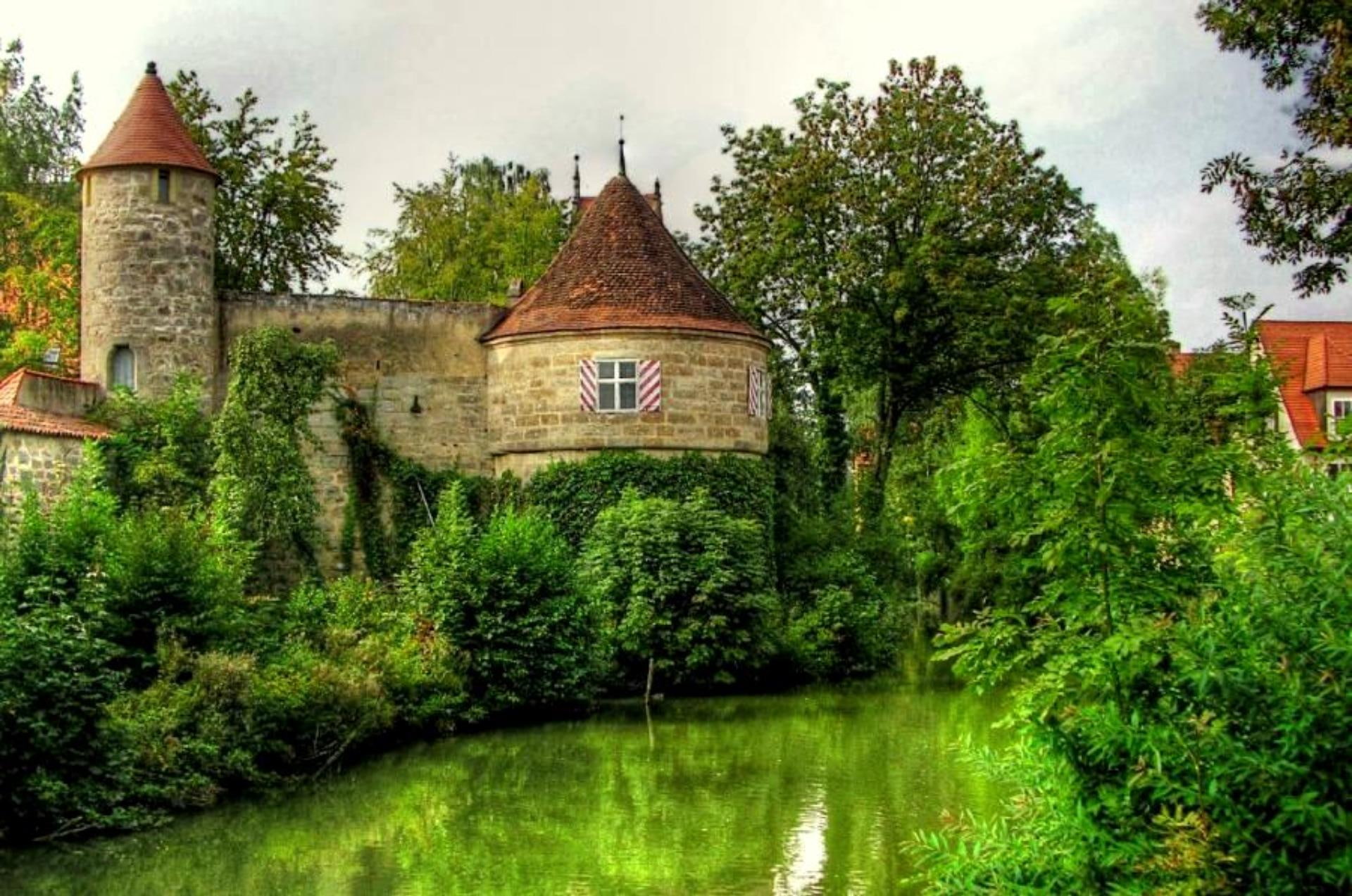 Green Among Greens, beige concrete house, water, trees, castle