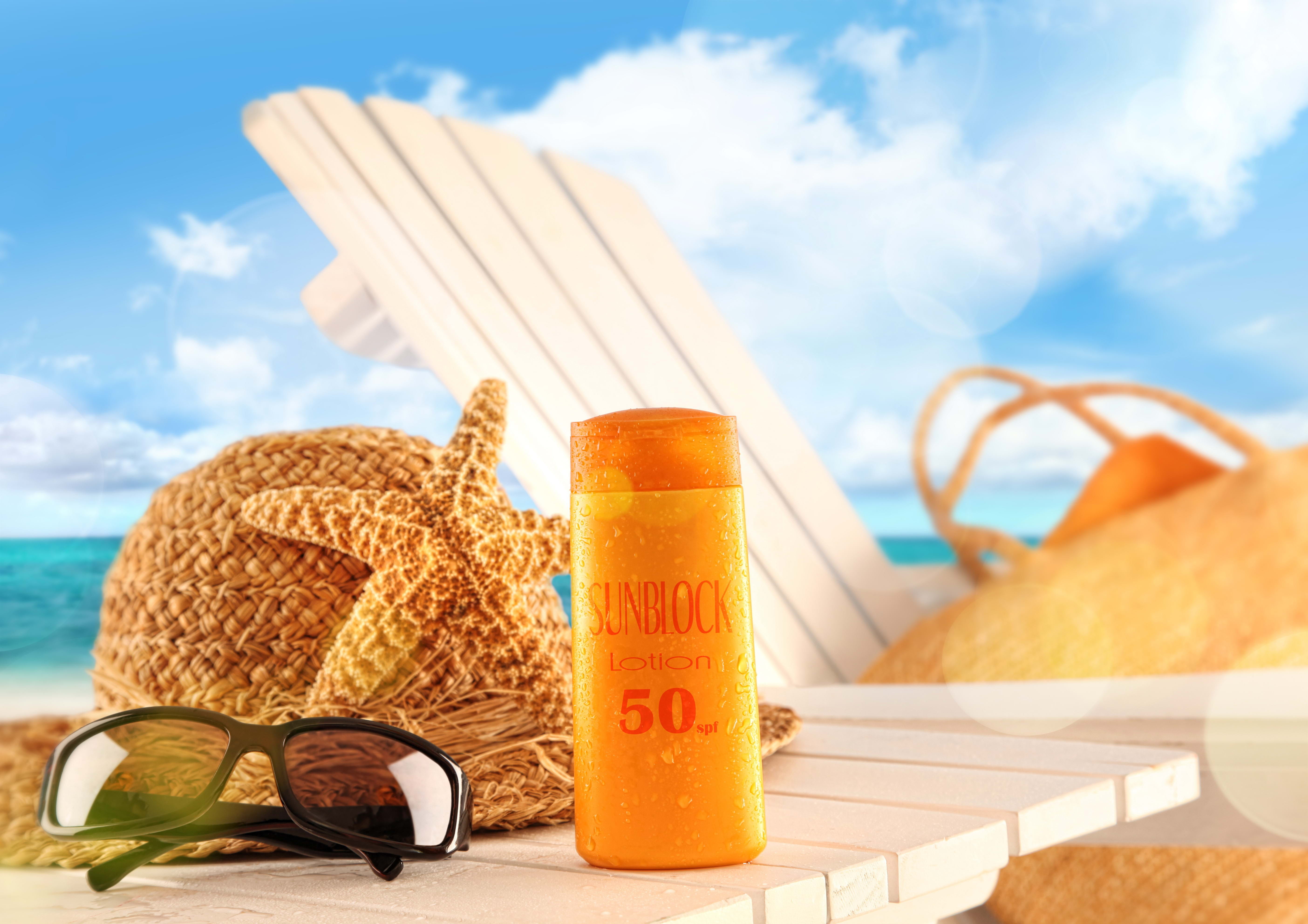 orange plastic bottle, cream, tan, protection, sea, beach, summer