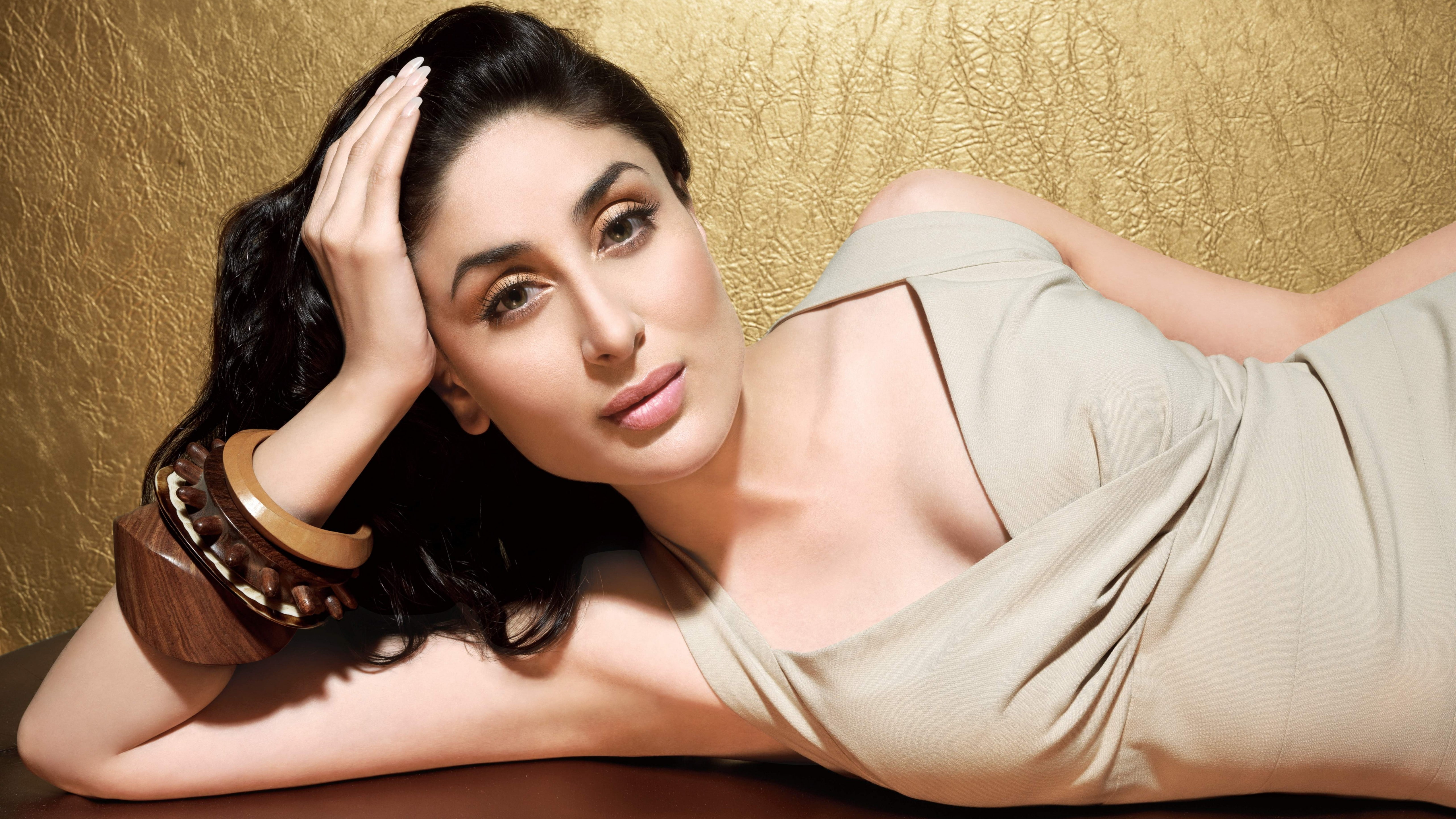 woman in gray halter strap dress lying on floor, Kareena Kapoor