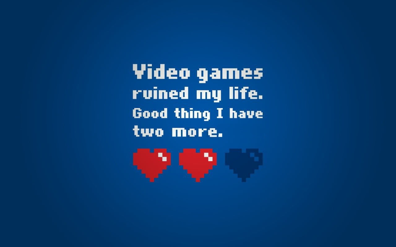 blue background with video games text overlay, heart, typography