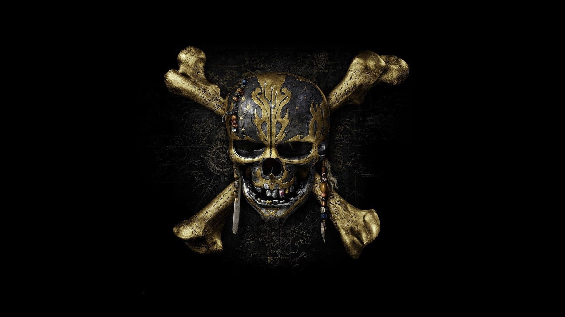 bronze-colored crossbone, yellow and black skull decor, skull and bones