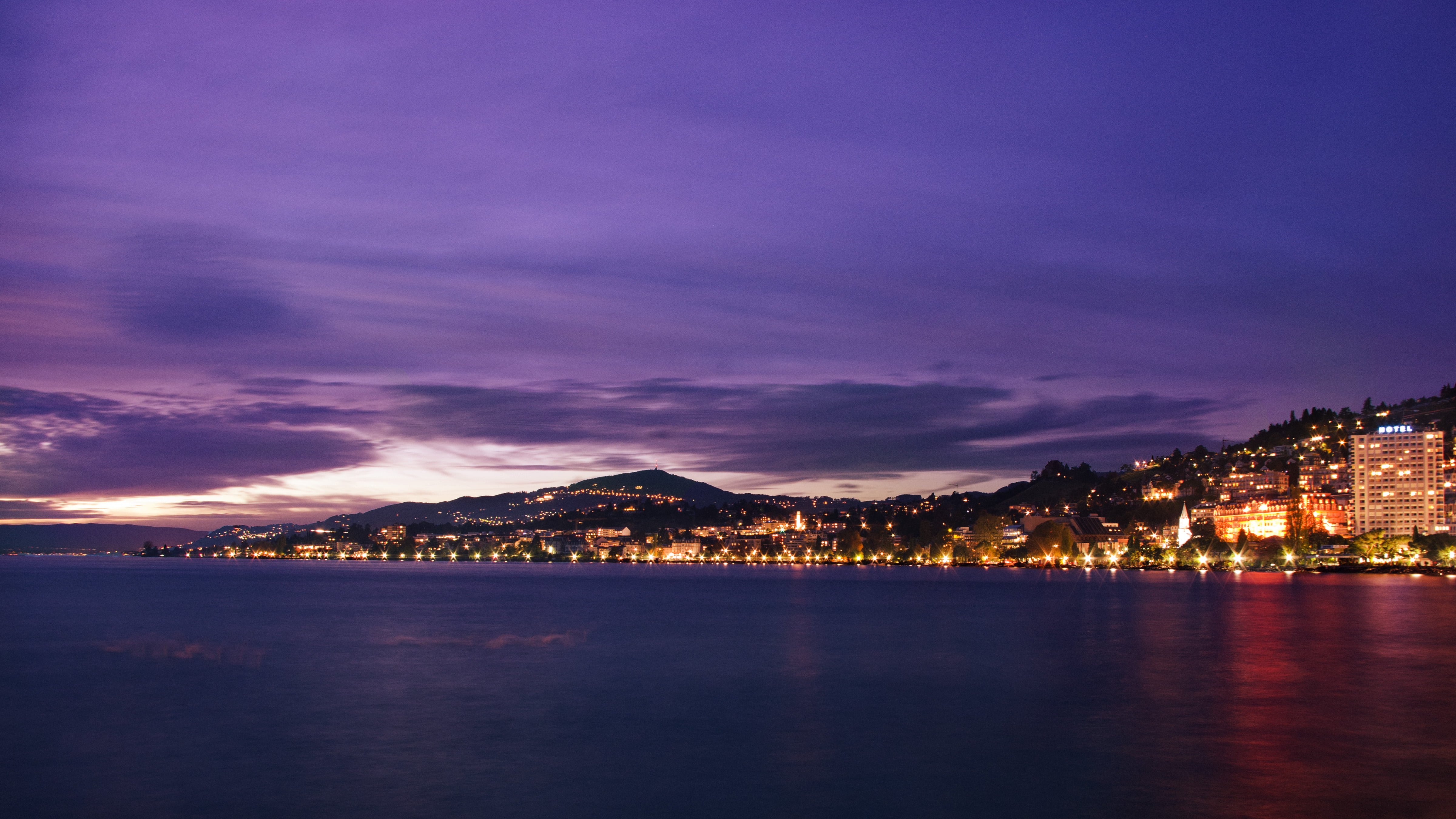 purple and white skies and City with Lights, montreux, montreux