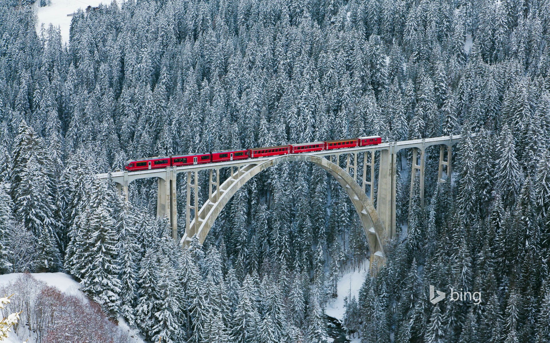 Train crossing the snowy forest-Bing wallpaper, winter, cold temperature