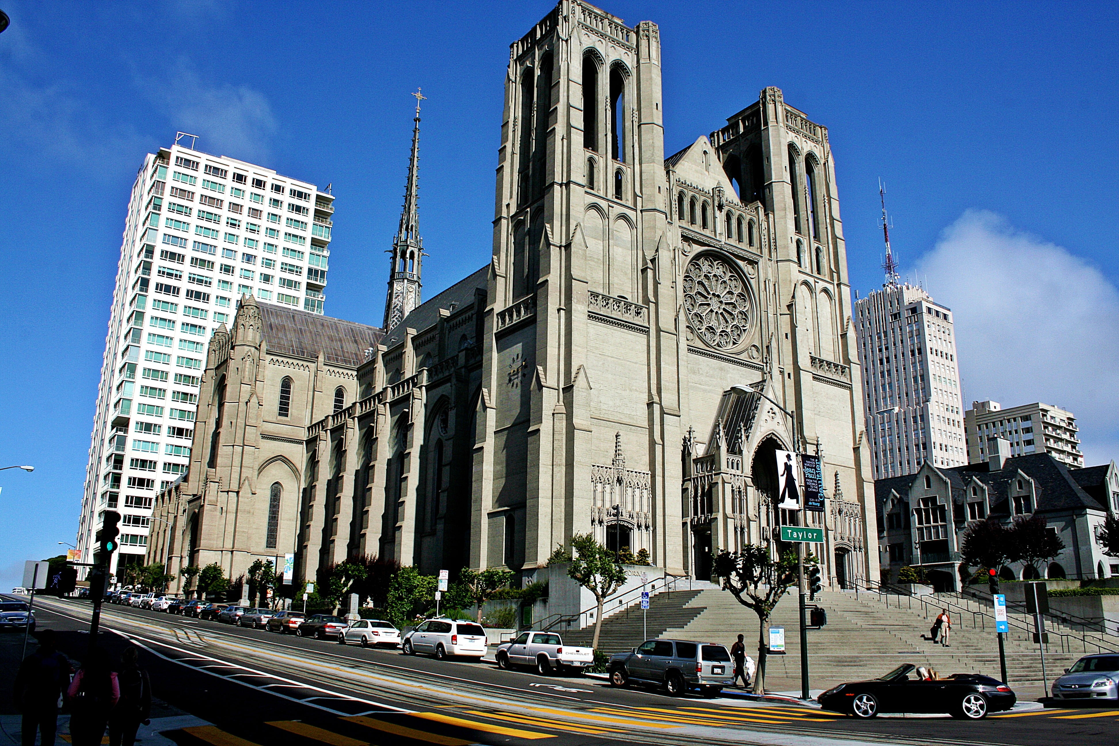 gray concrete church, San Francisco, praying, cityscape, street