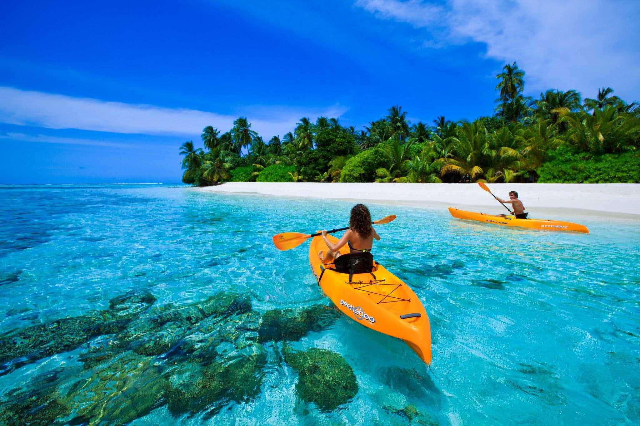 Canoe On Blue Lagoon In Maldives, two orange kayak, island, exotic