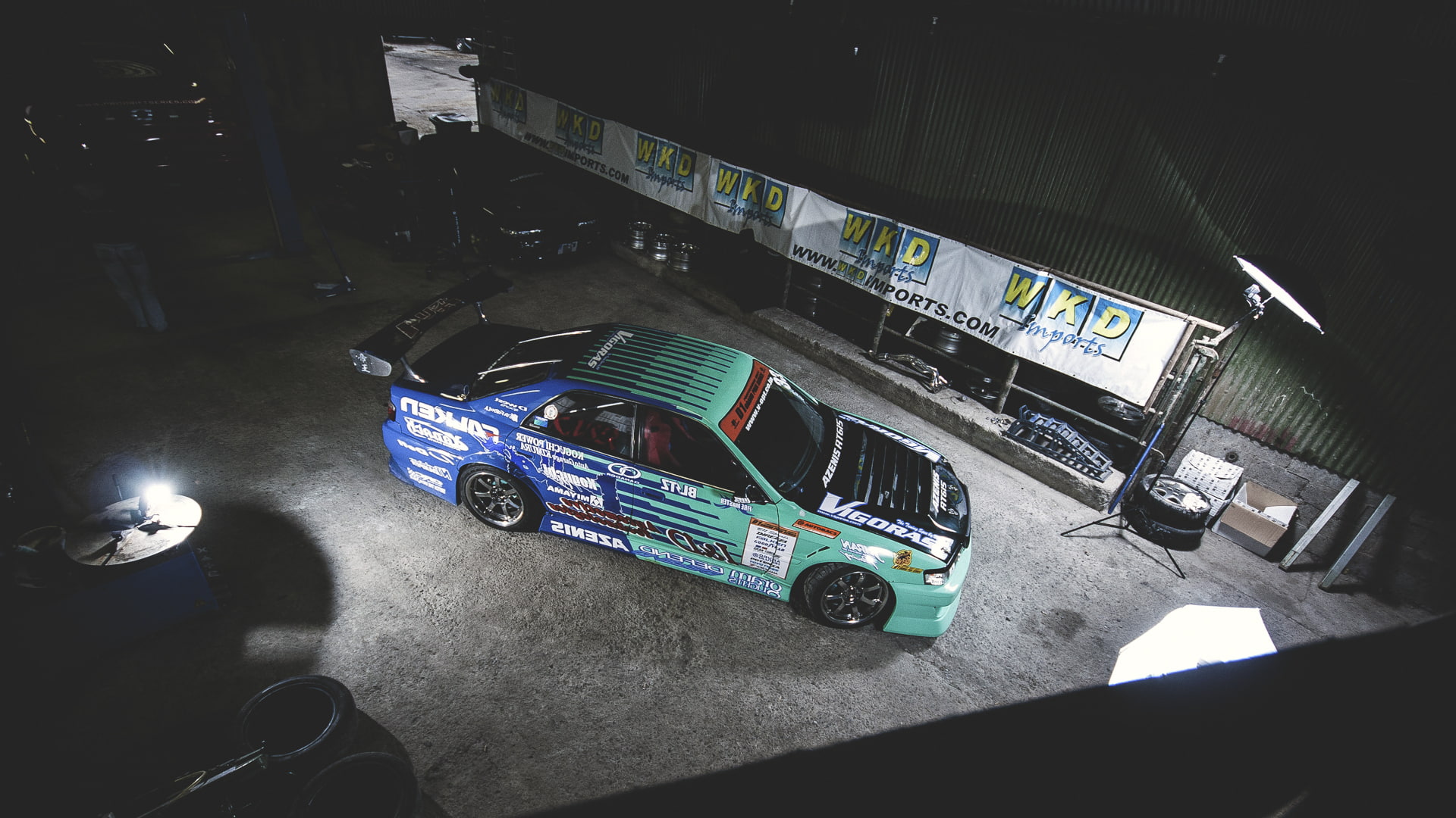 green and blue rally car, garage, drift, Toyota, chaser, mode of transportation