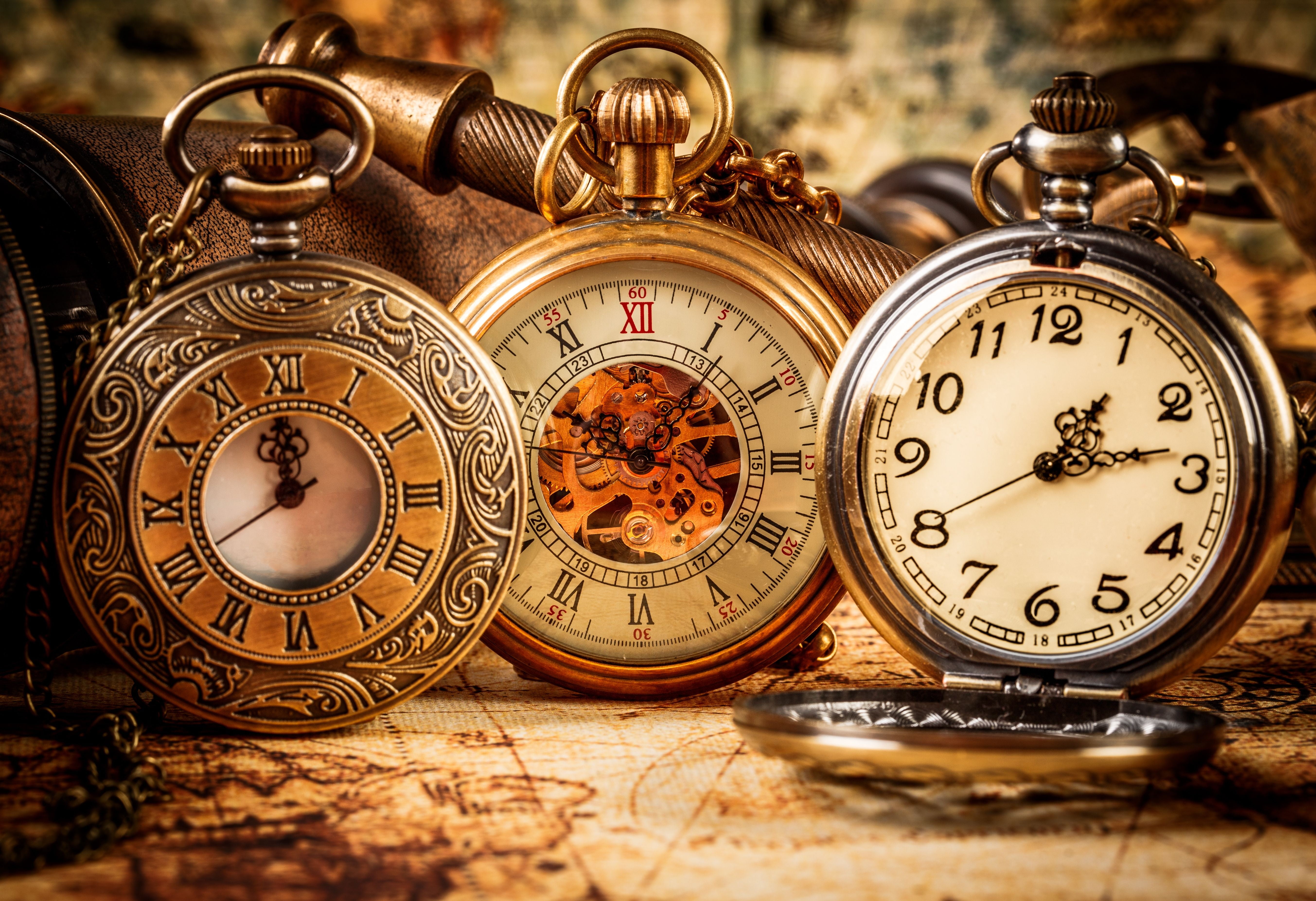 three gold-and-silver-colored pocket watches, division, time zones