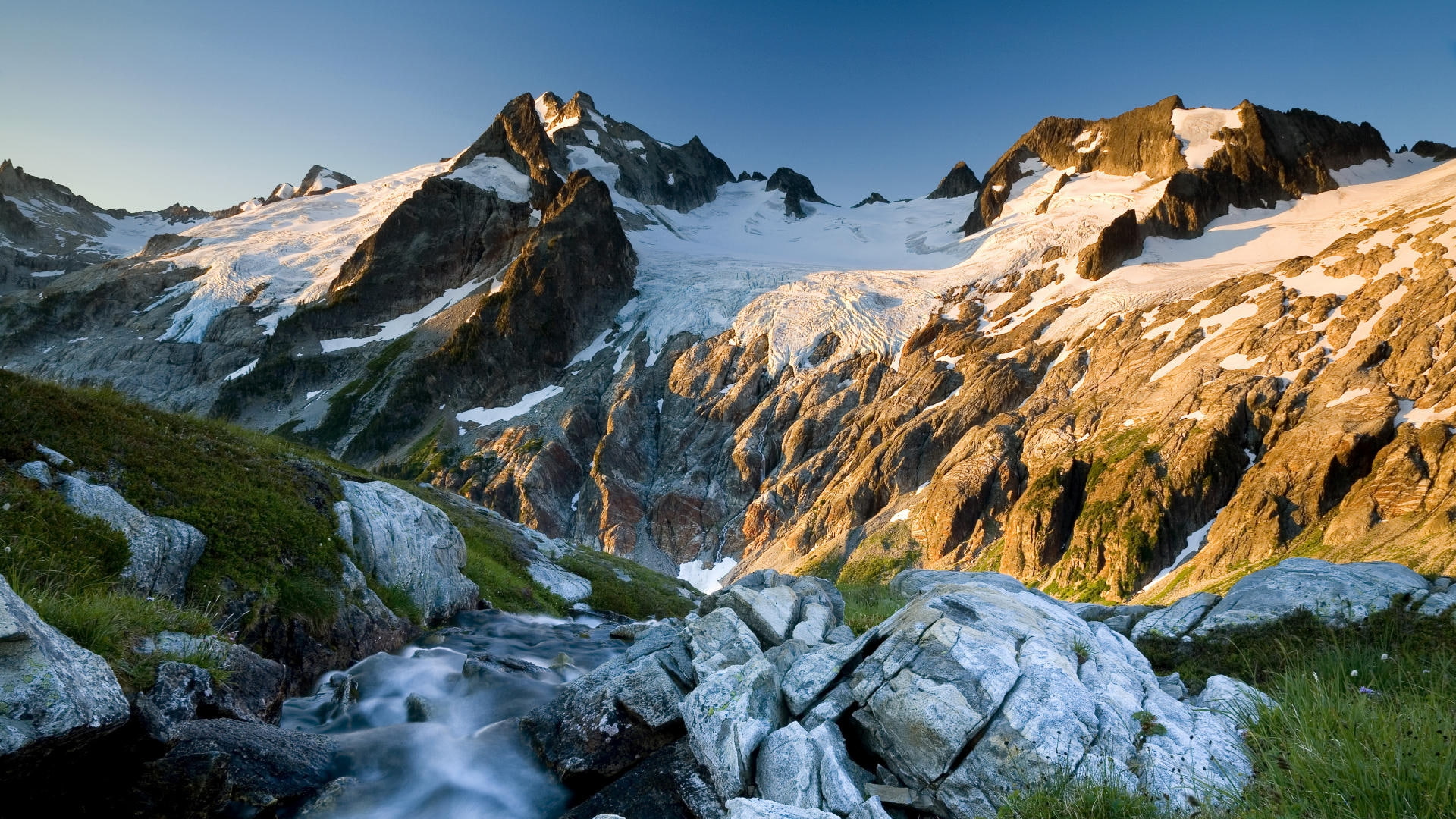 snowcap mountains and grass dr tobias nke 1920x1080  Nature Mountains HD Art