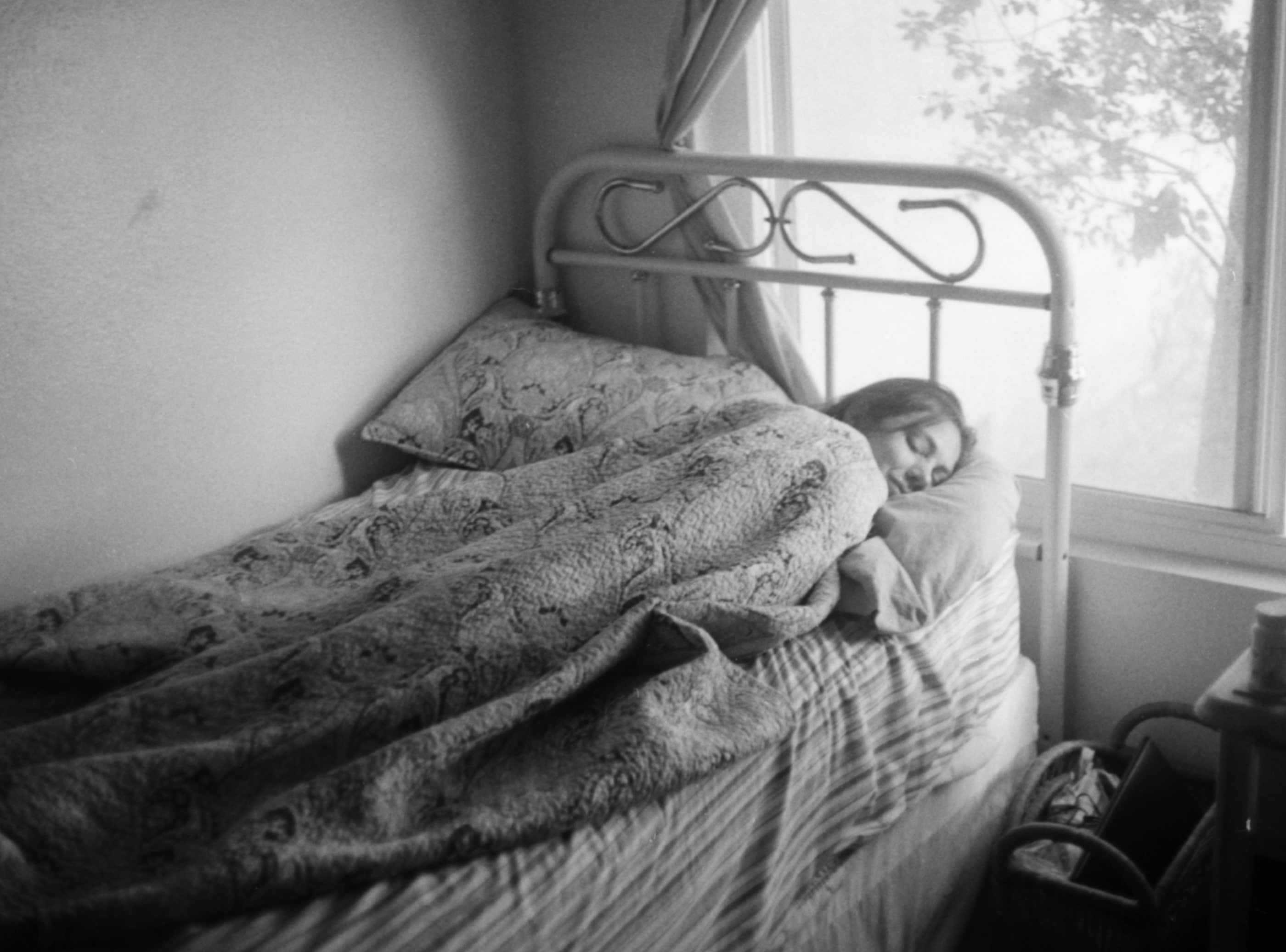 Beautiful Dreams, grayscale photography of woman sleeping inside room