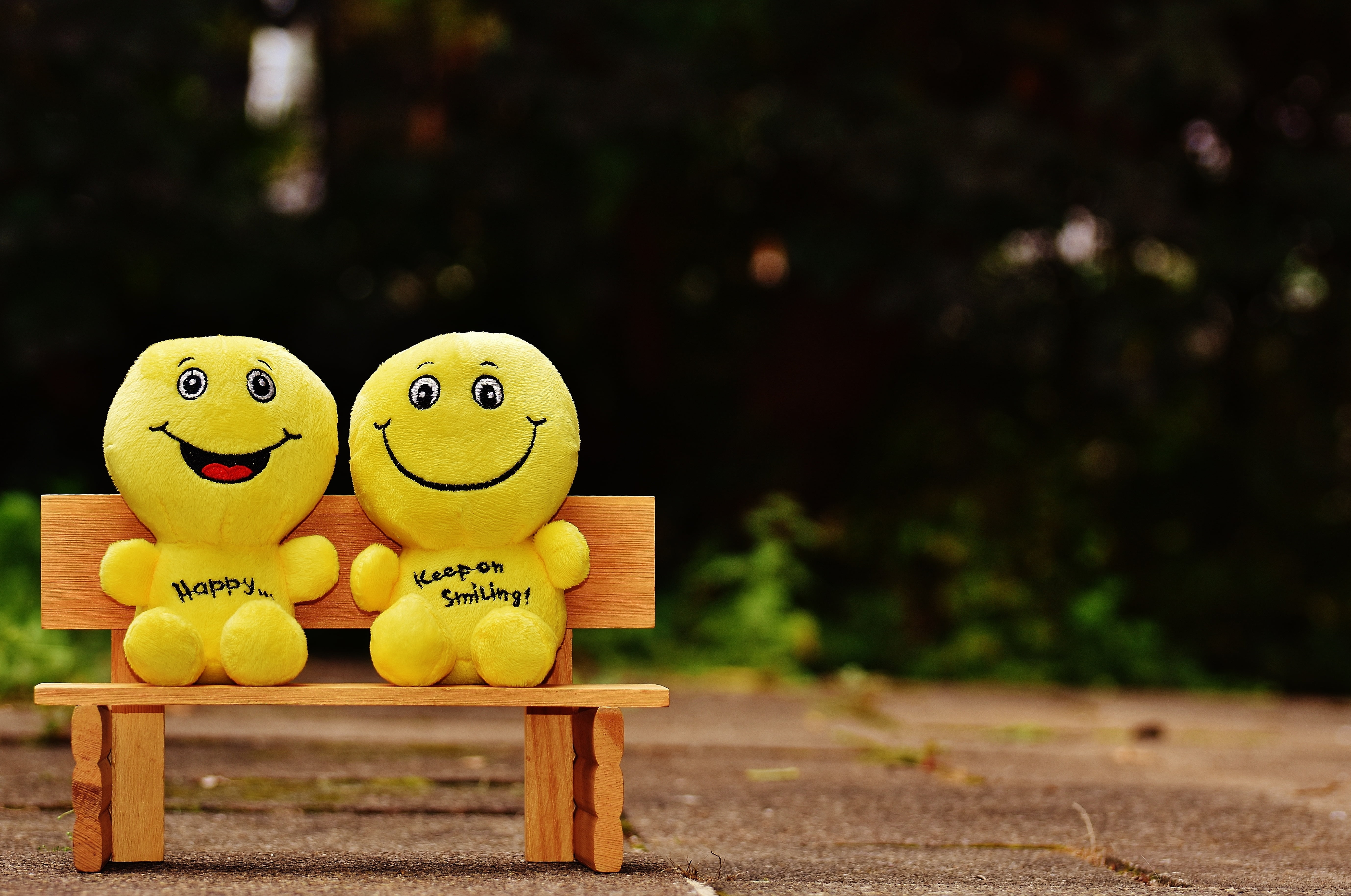 two happy emoji plush toys, smiles, cheerful, bench, cute, wood - Material