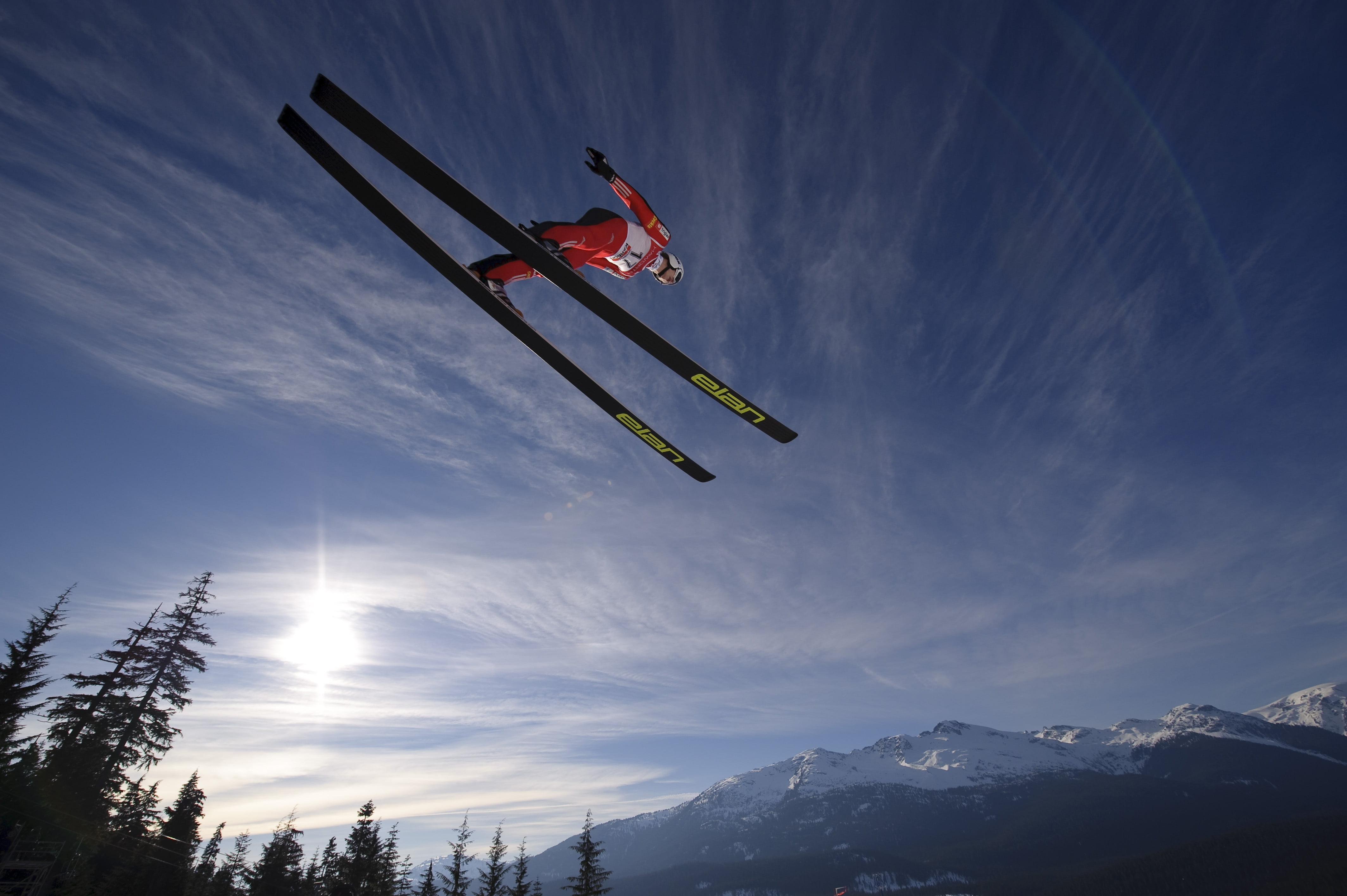 pair of black snow skis, skier, jump, fly, sky, sun, mountains
