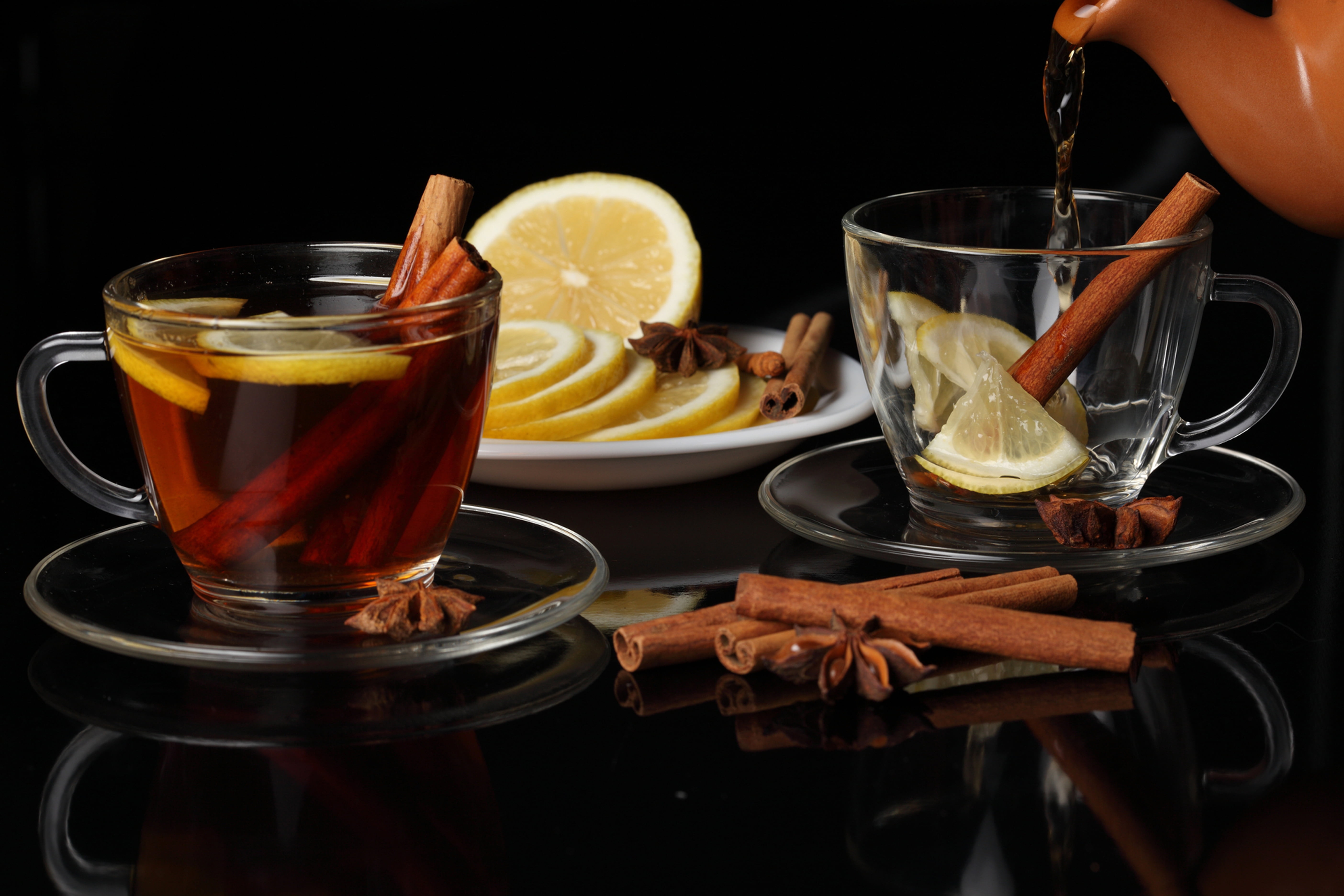 clear glass teacup and saucers, drink, service, cinnamon, lemon