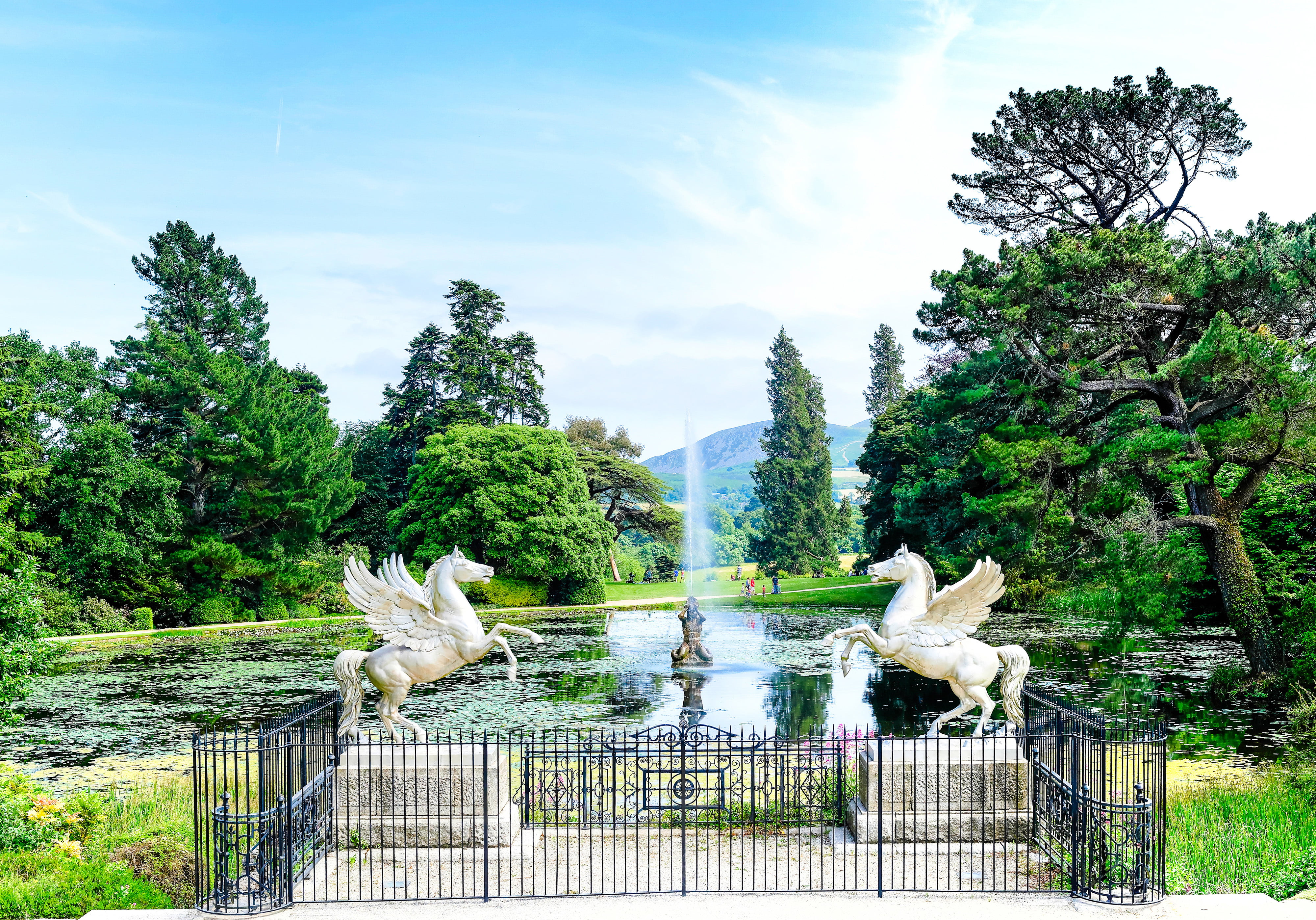 white unicorn statues, the sky, trees, pond, Park, people, horse