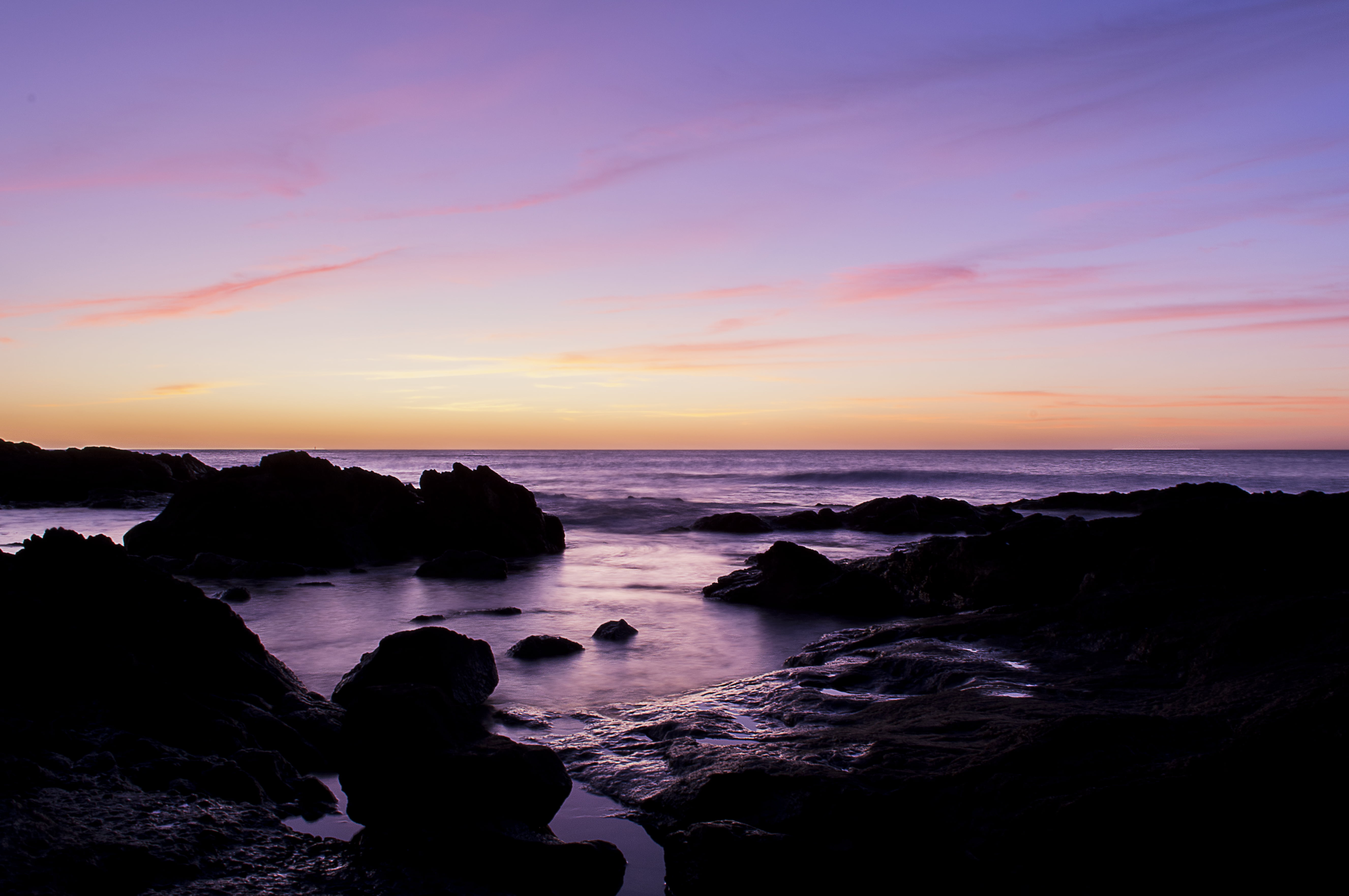 silhouette of rock on the seashore during sunset, Primera, First