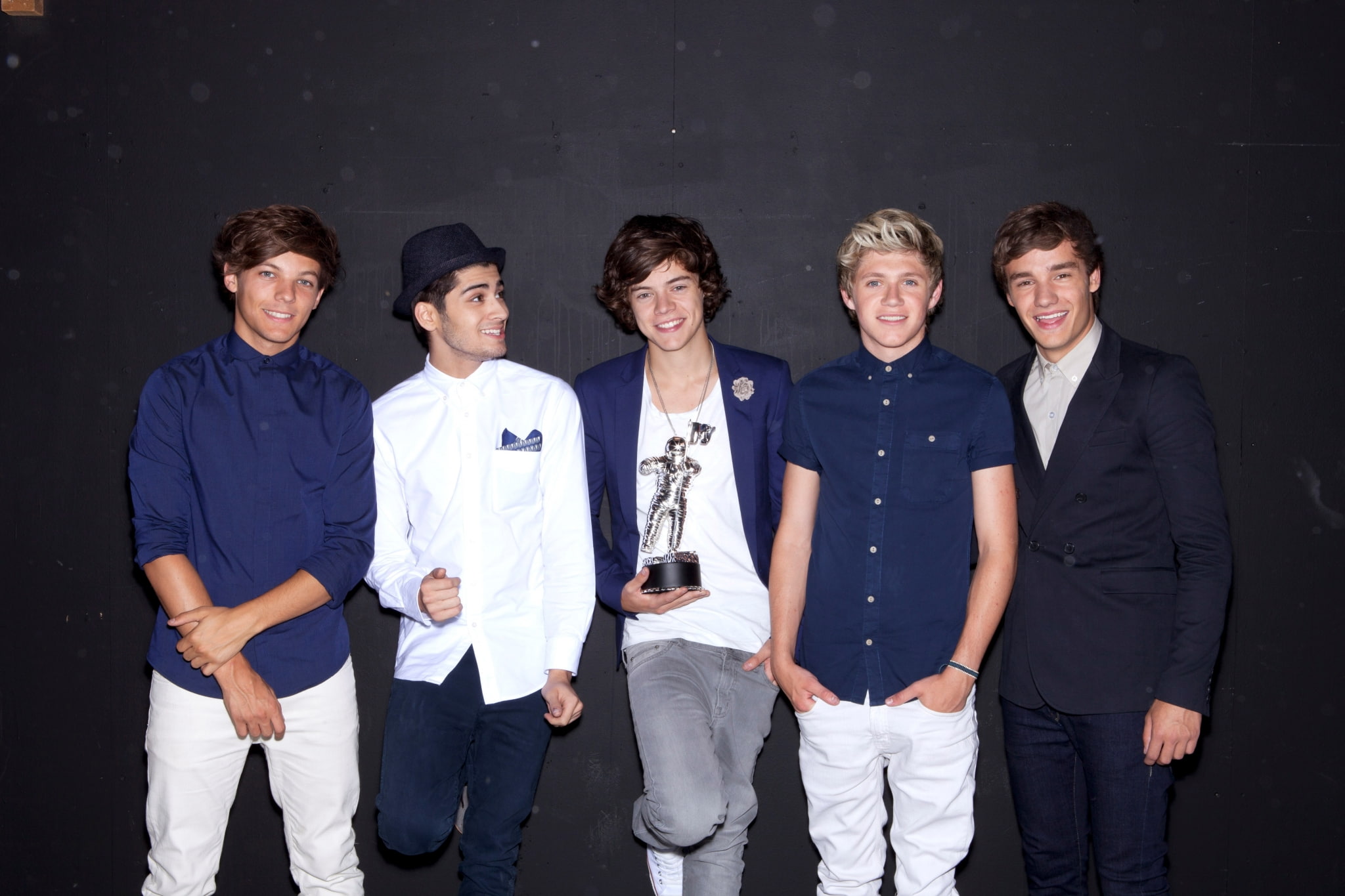 one direction  computer, looking at camera, group of people