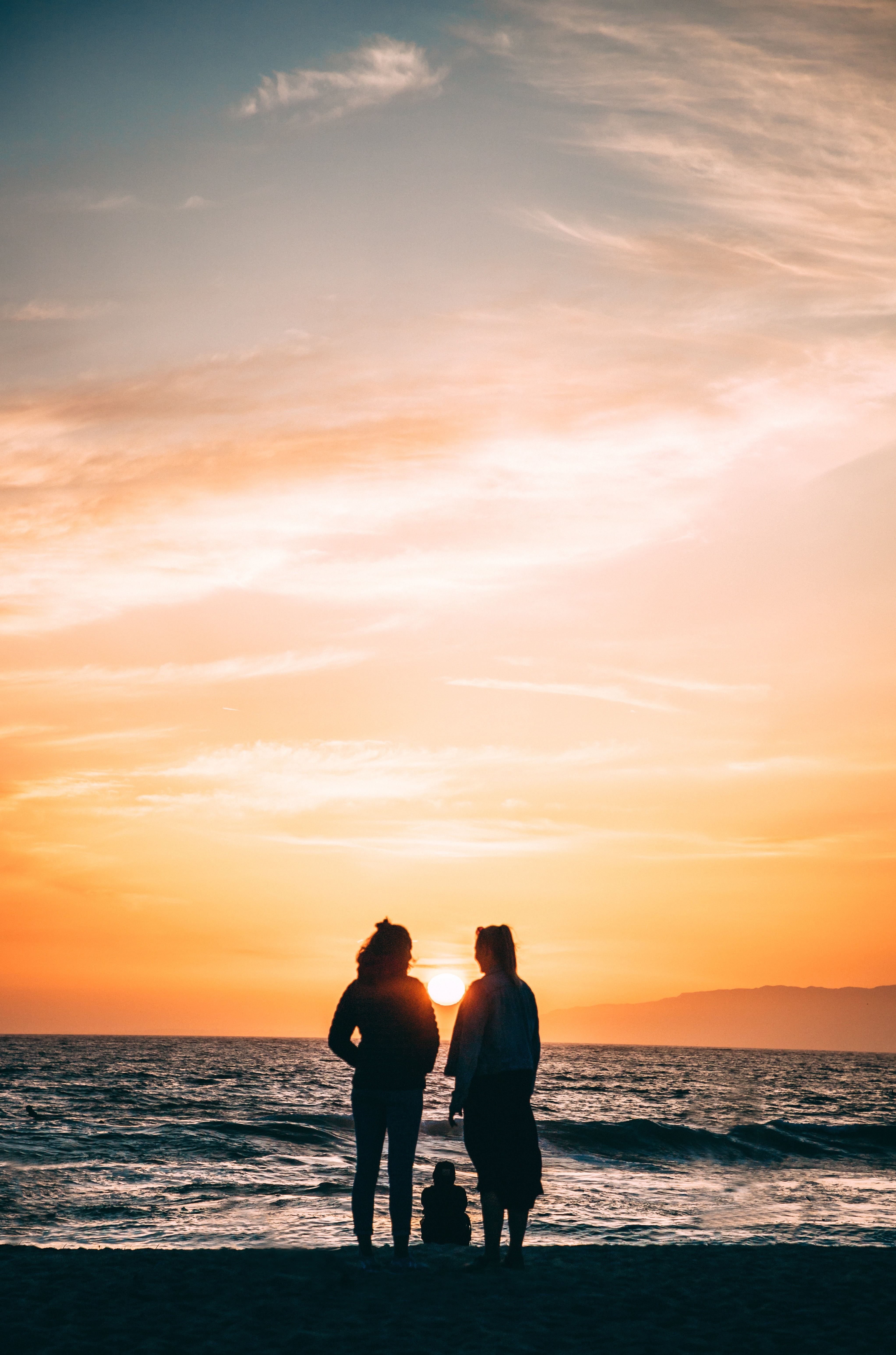 silhouette of woman, family, silhouettes, sea, shore, sunset