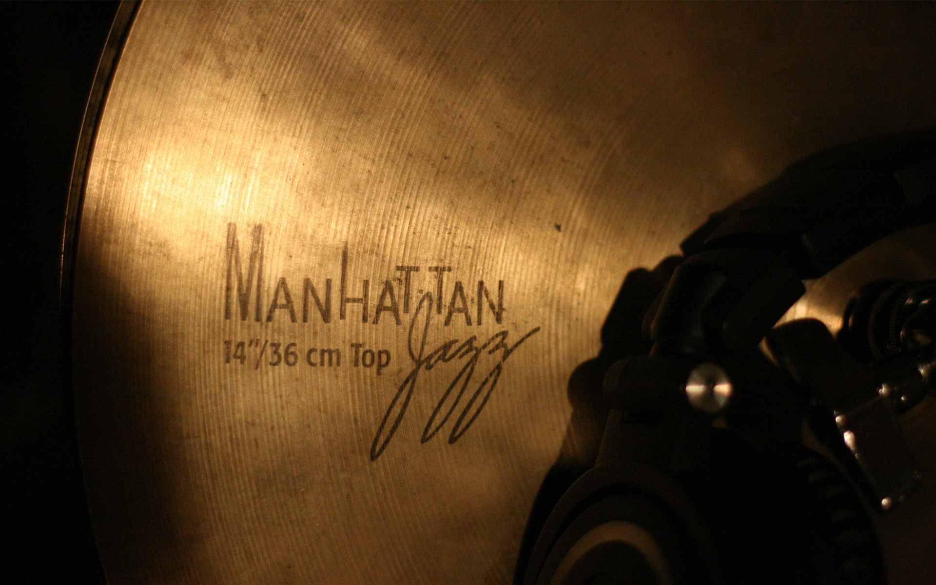brass-colored Manhattan jazz cymbal, music, the inscription, plate