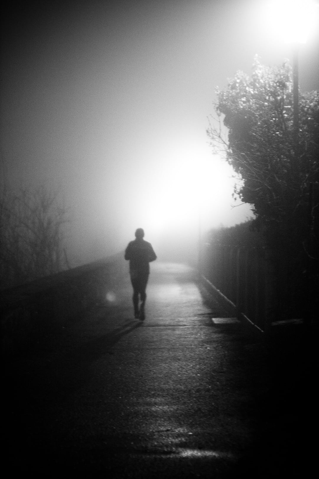 silhouette of man running during night time, jogger, winter, cold