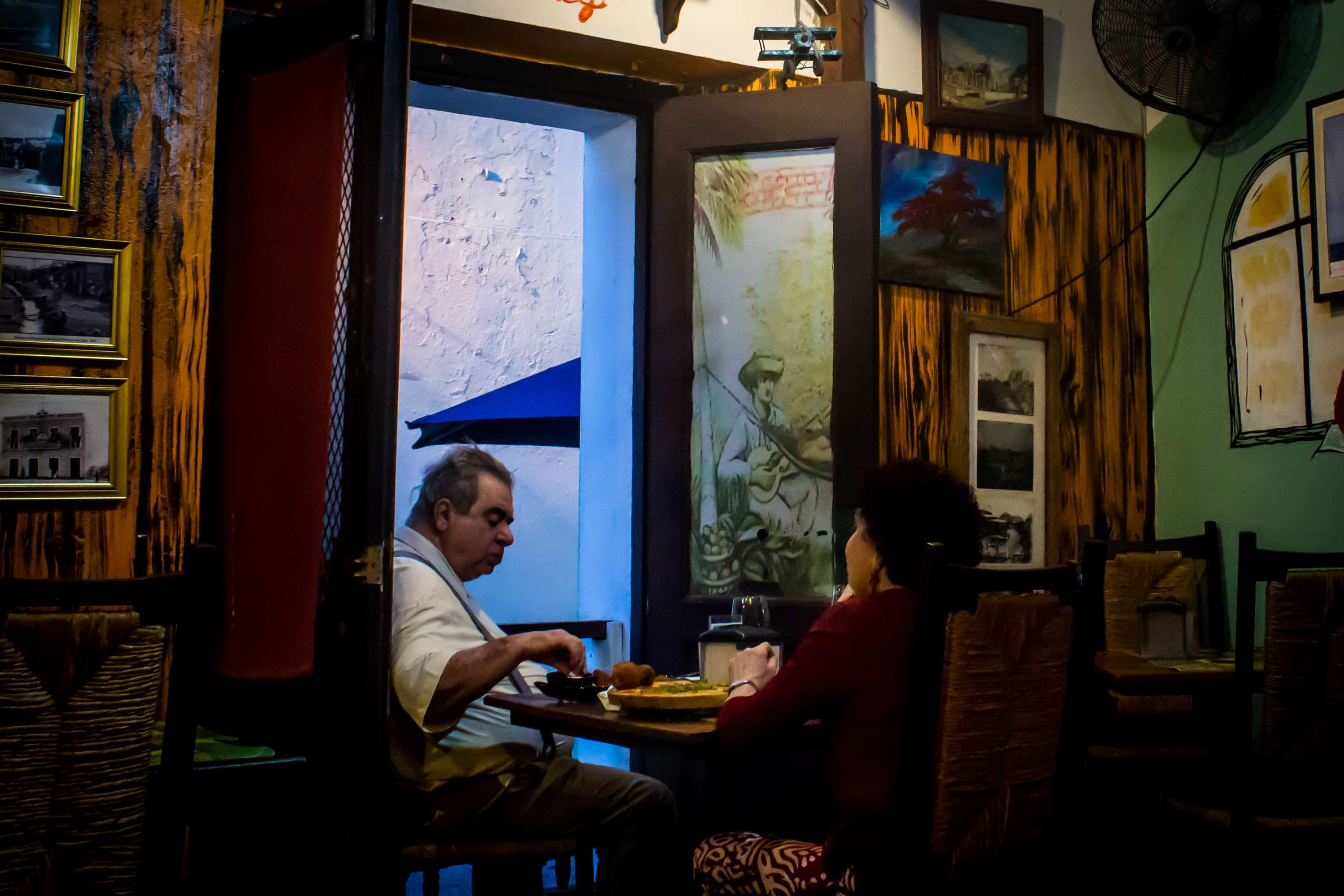 locals, old couple, people eating, san juan puerto rico, men