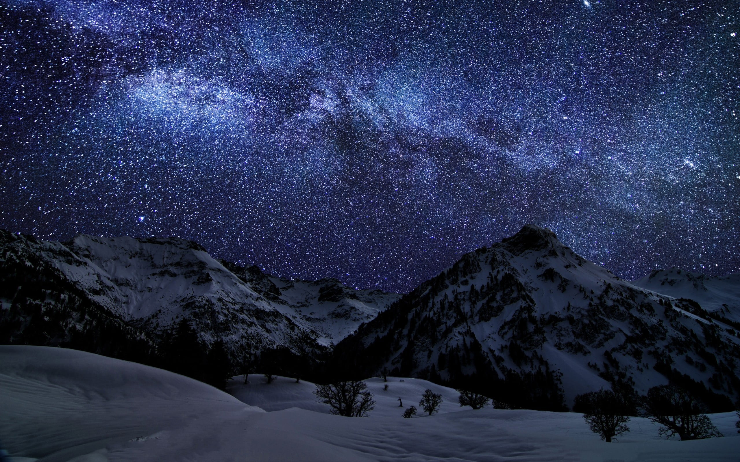 snow-covered mountains under starry sky, photography of mountain with snows