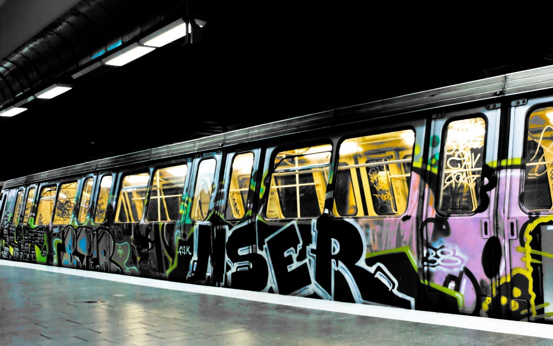 assorted graffiti, subway, public transportation, train, rail transportation