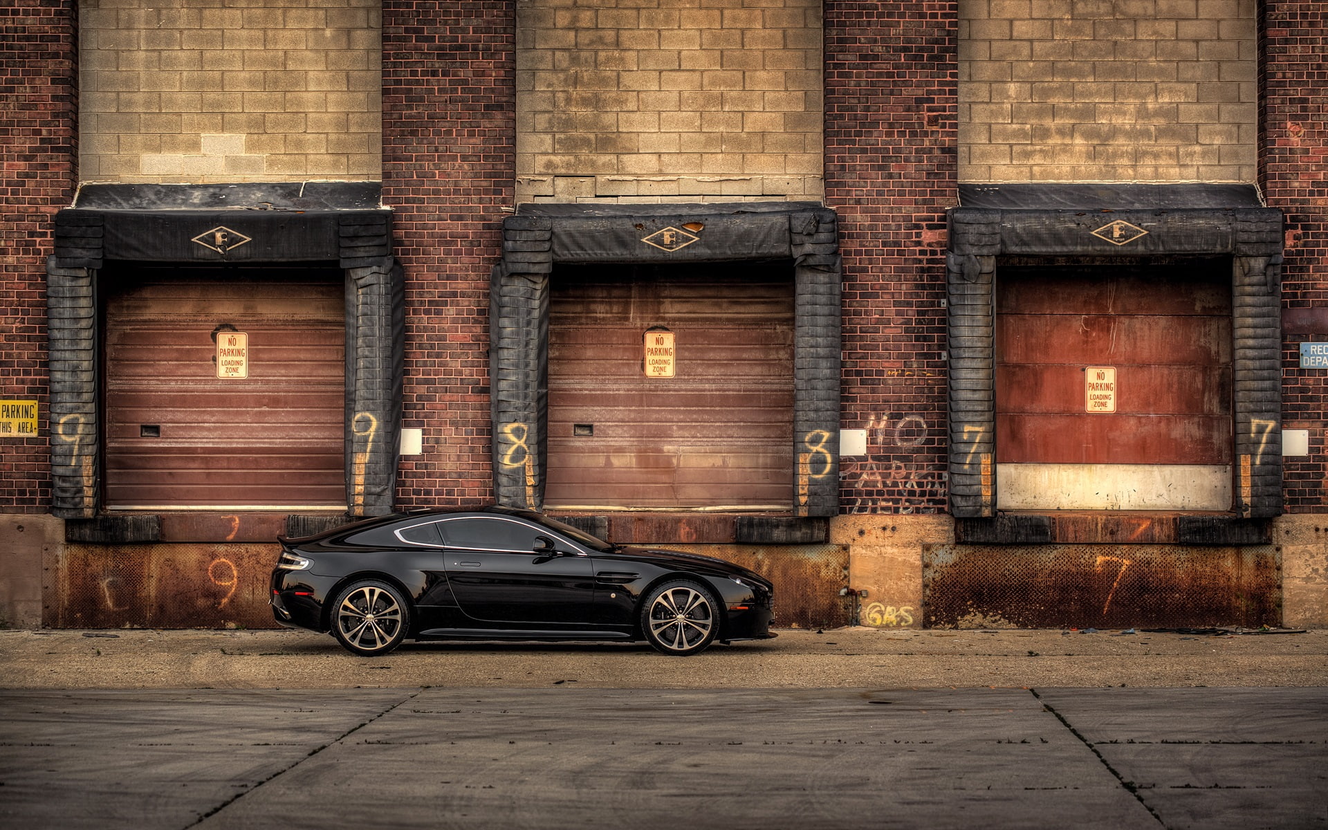 Aston Martin V12 Vantage Carbon Edition black car side view