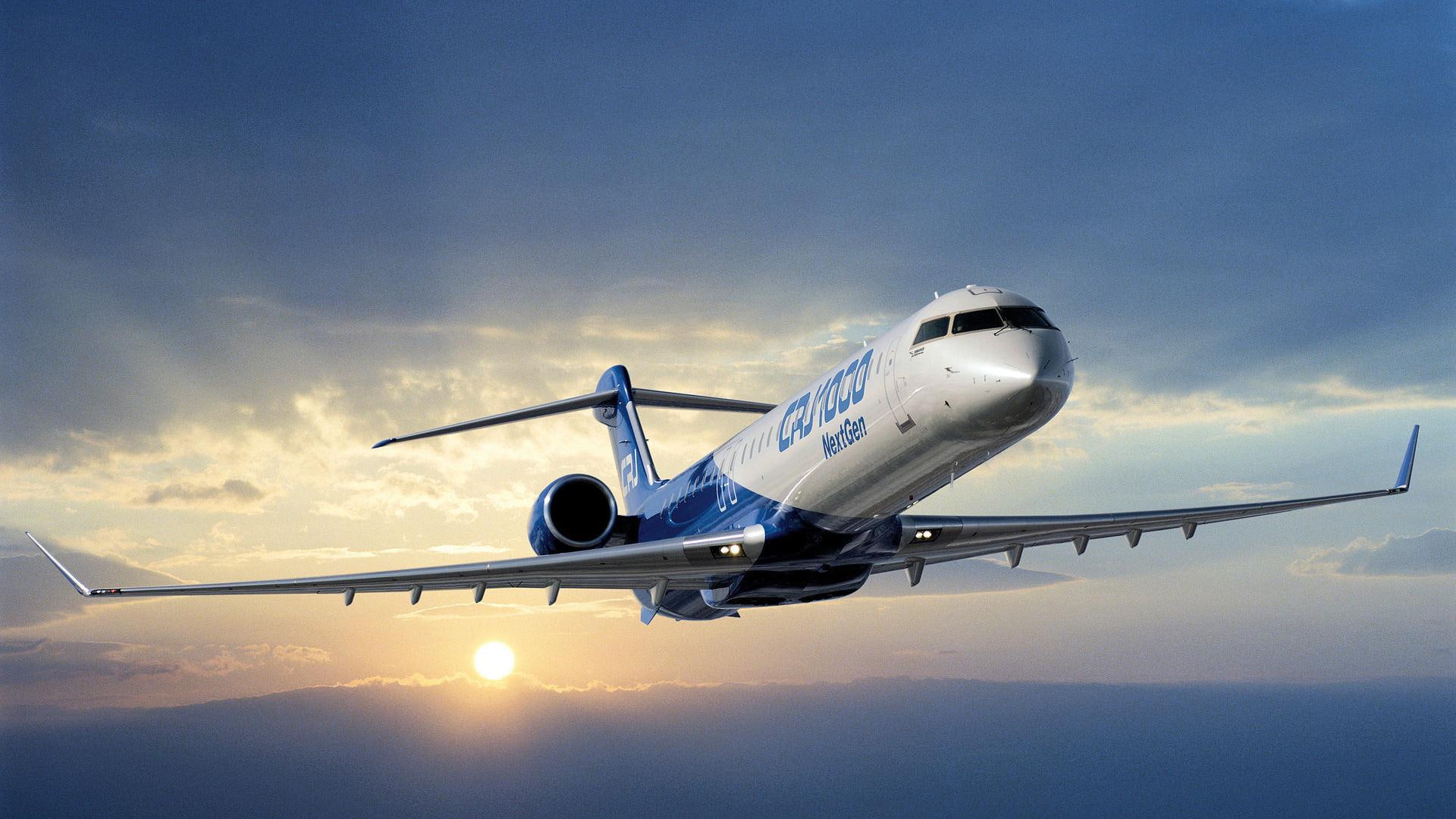 Bombardier Crj-1000 Next Gen, white and blue steel plane, airplane