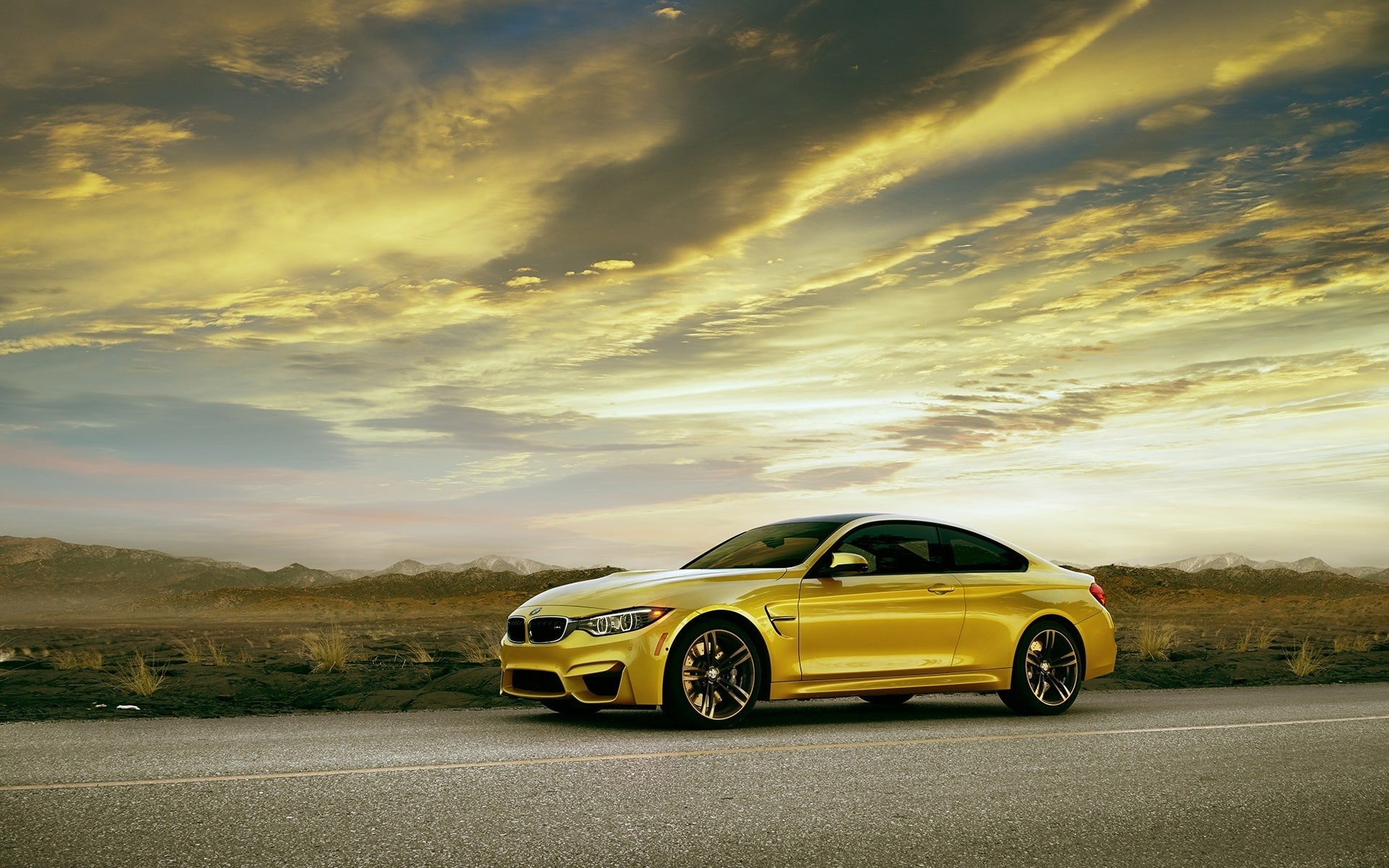 BMW M4 Coupe F82 yellow car side view
