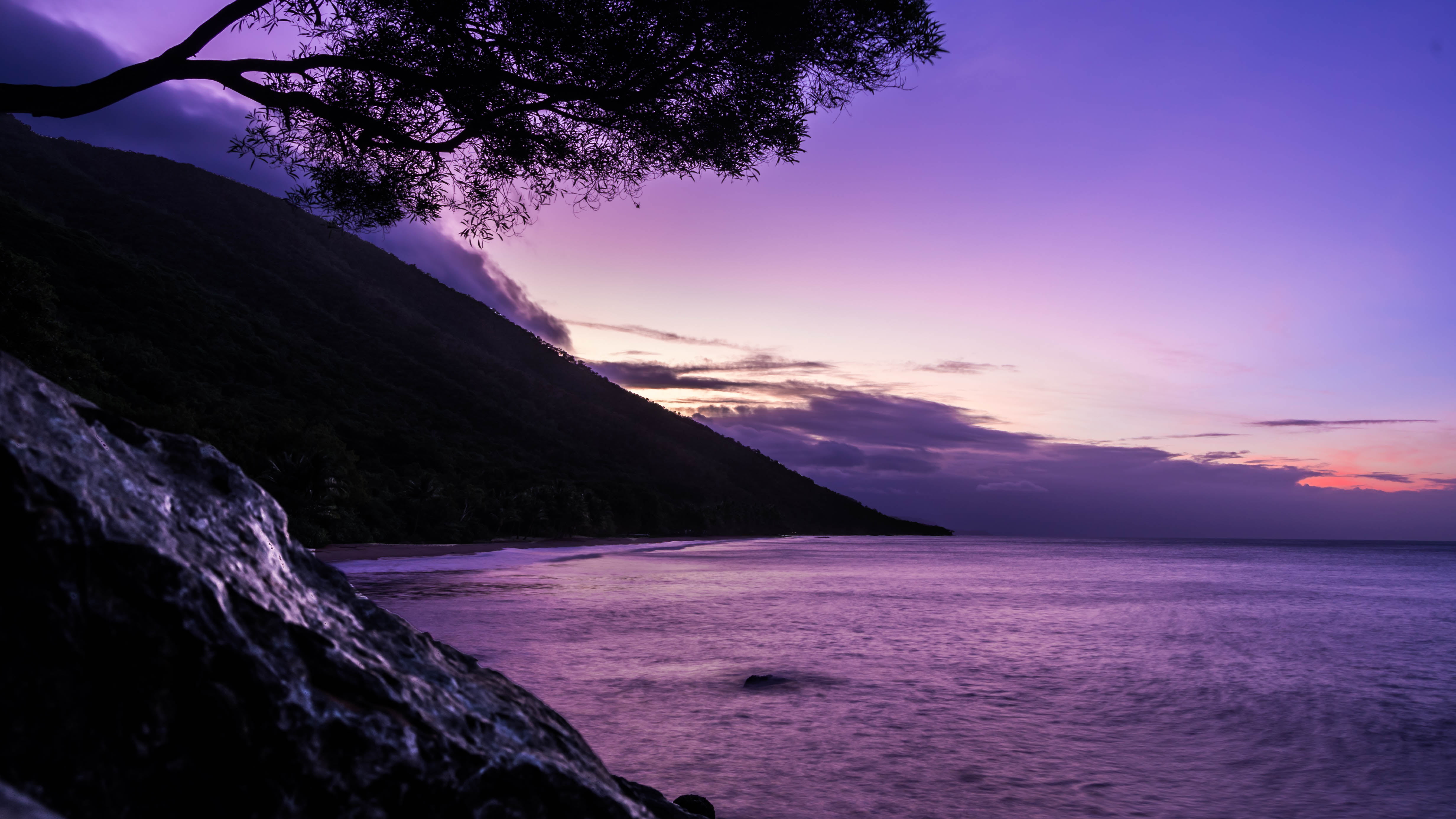 photography of mountain near sea under purple sky, port douglas, port douglas