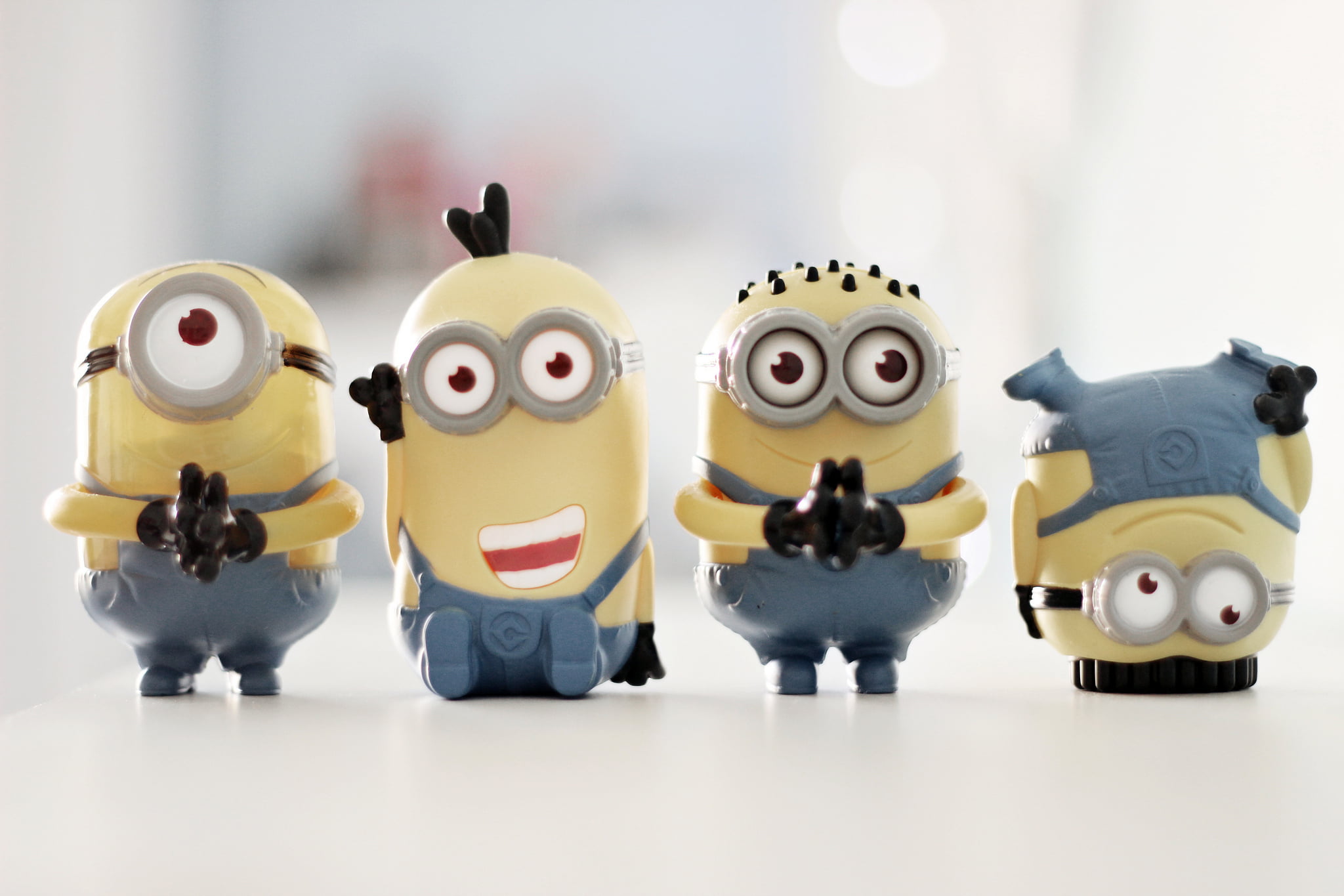 four Despicable Me Minions toys, mood, piggy Bank, characters