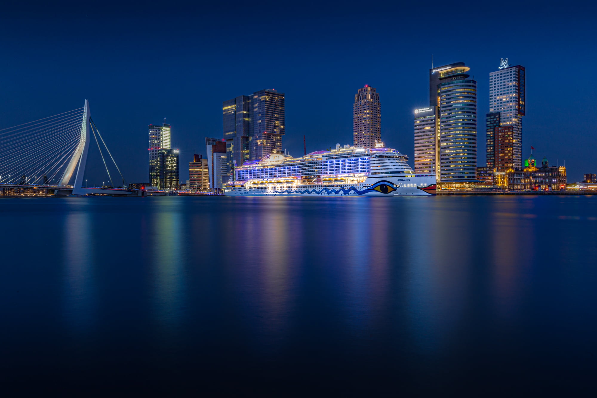 Luxury Cruise near city structures during night time, Aida, Rotterdam