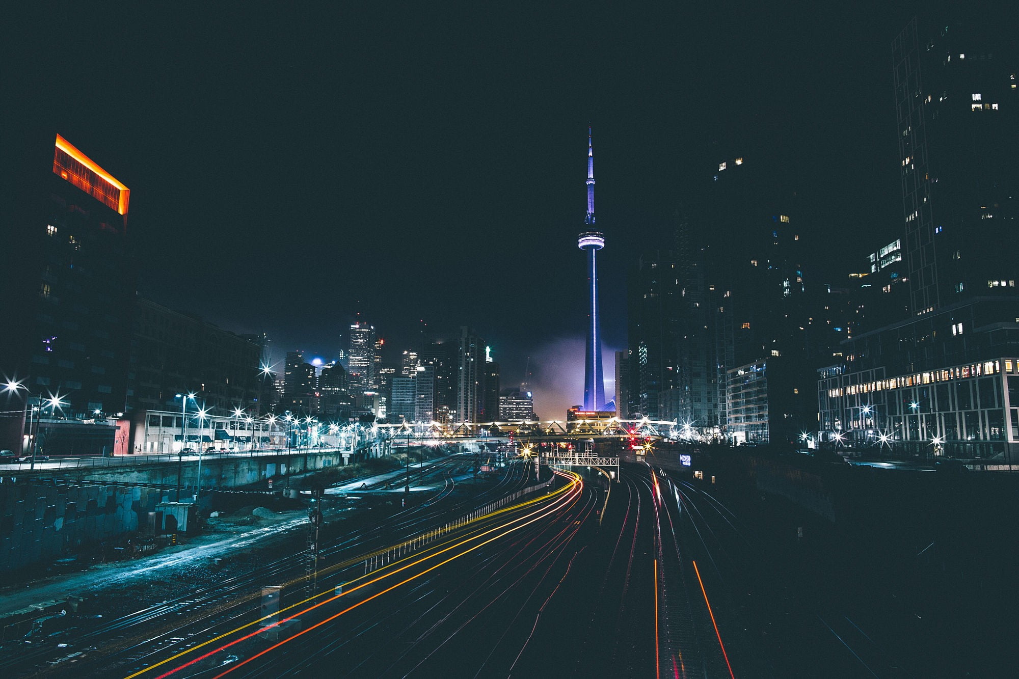 cityscape photo, city time lapse during night time, Toronto, railway