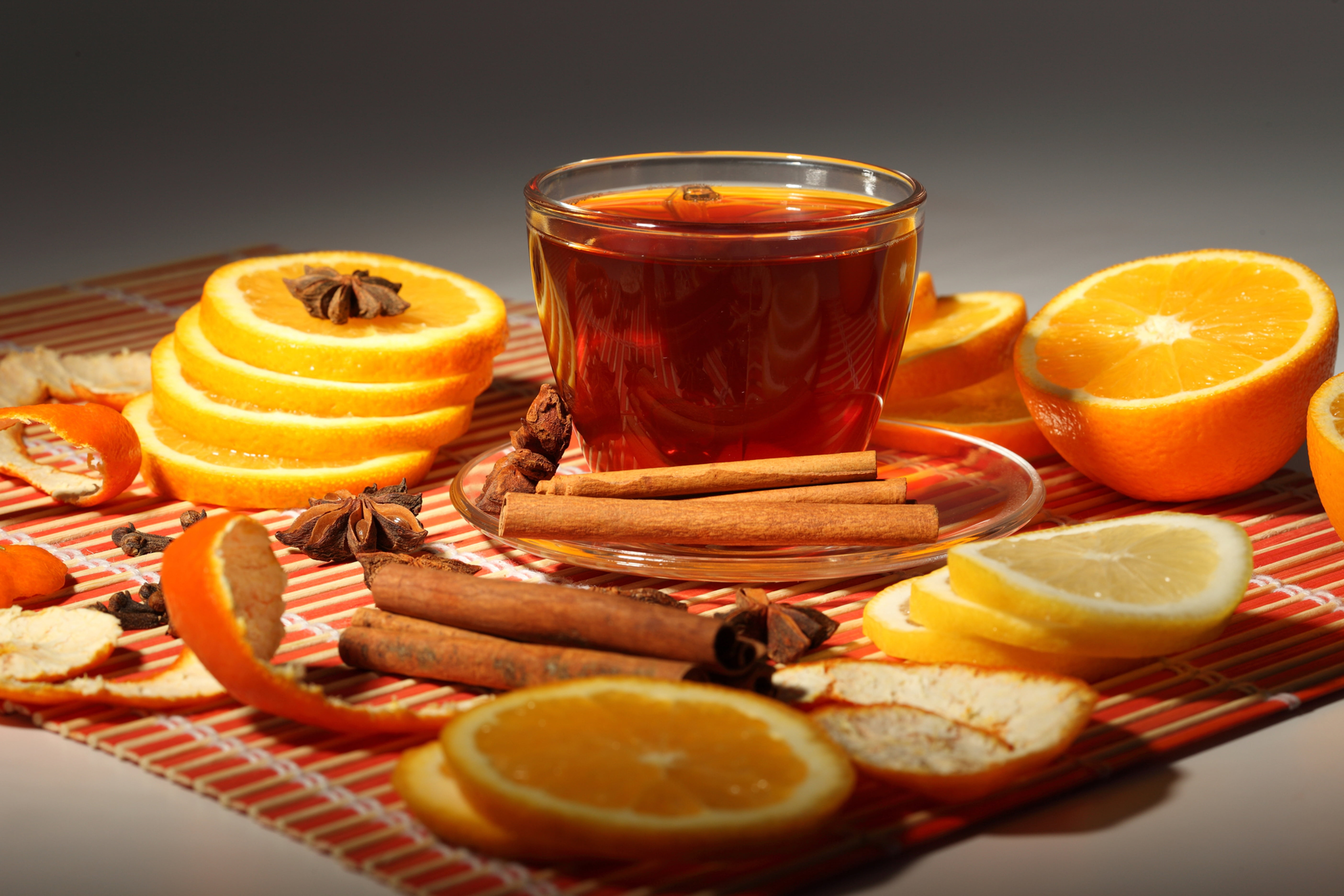 clear glass cup, tea, oranges, cinnamon, peel, vanilla, orange - Fruit