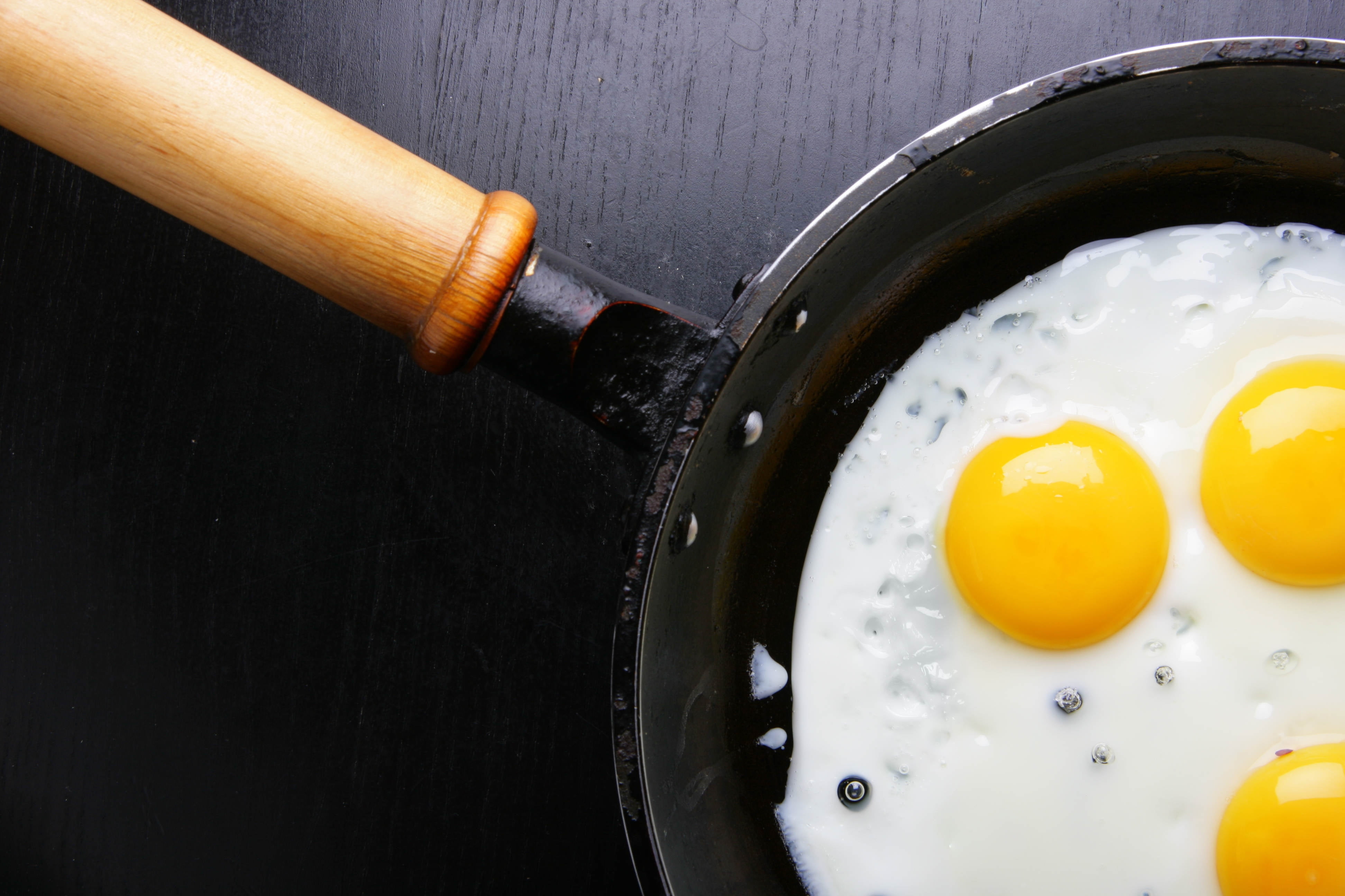 black frying pan, eggs, fried eggs, three, egg Yolk, food, cooking