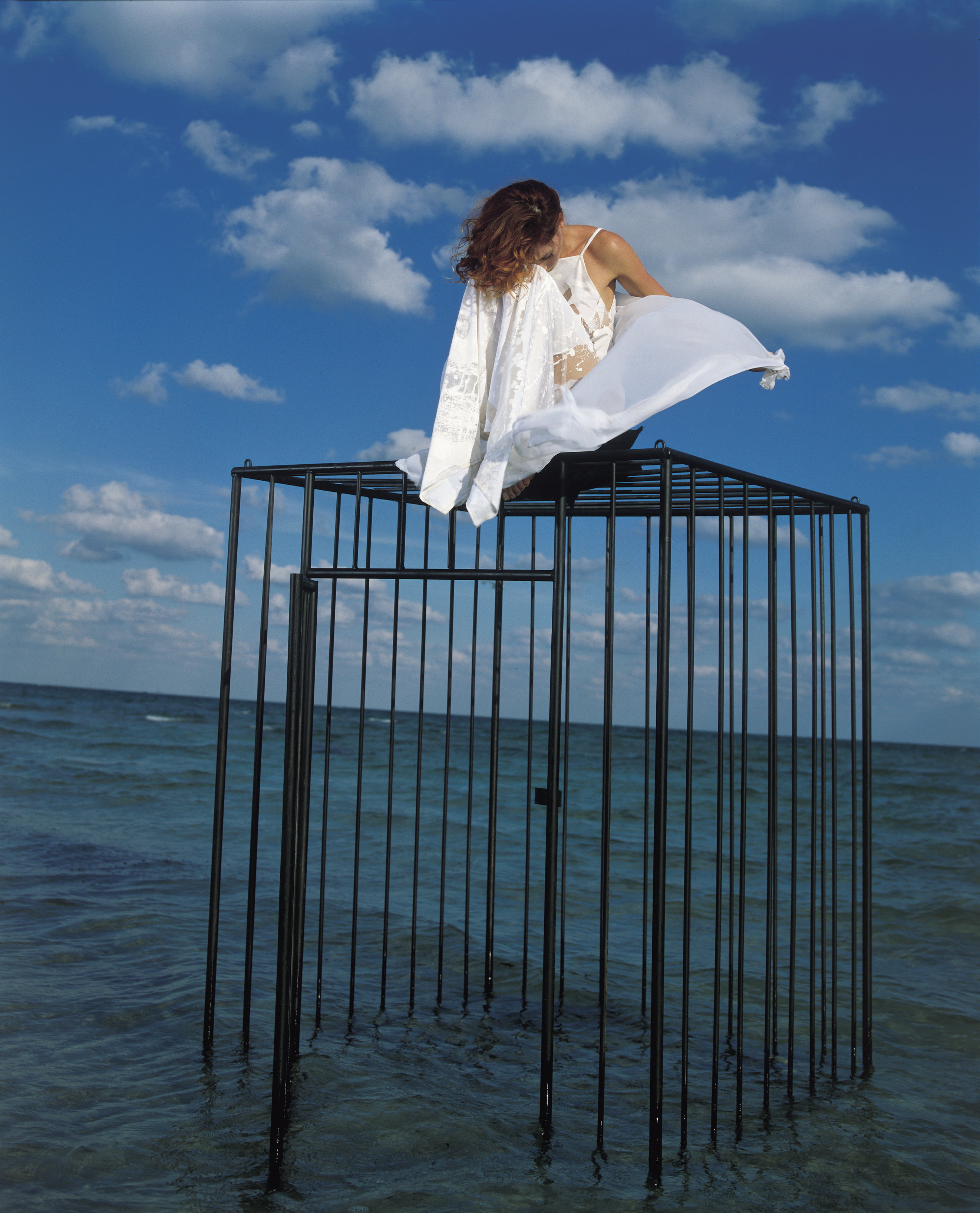 Mylène Farmer, redhead, French, singer, cages, sky, sitting