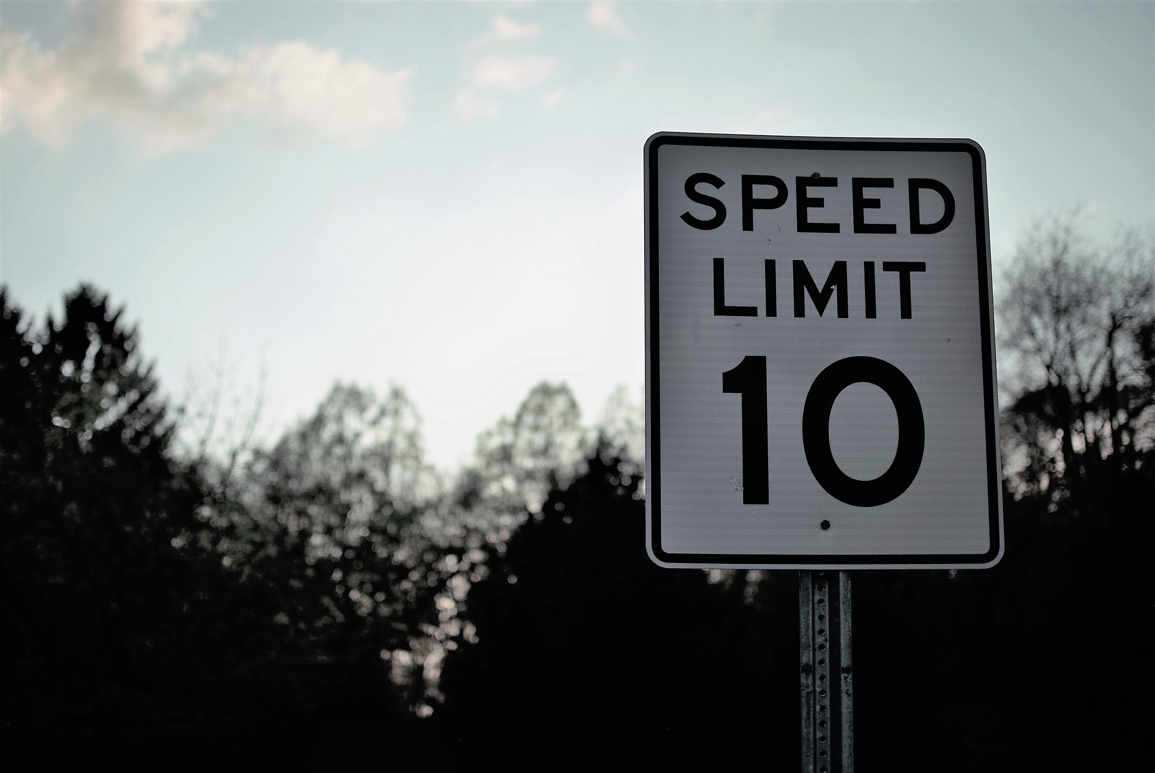 Speed Limit 10 signage, pointer, communication, western script