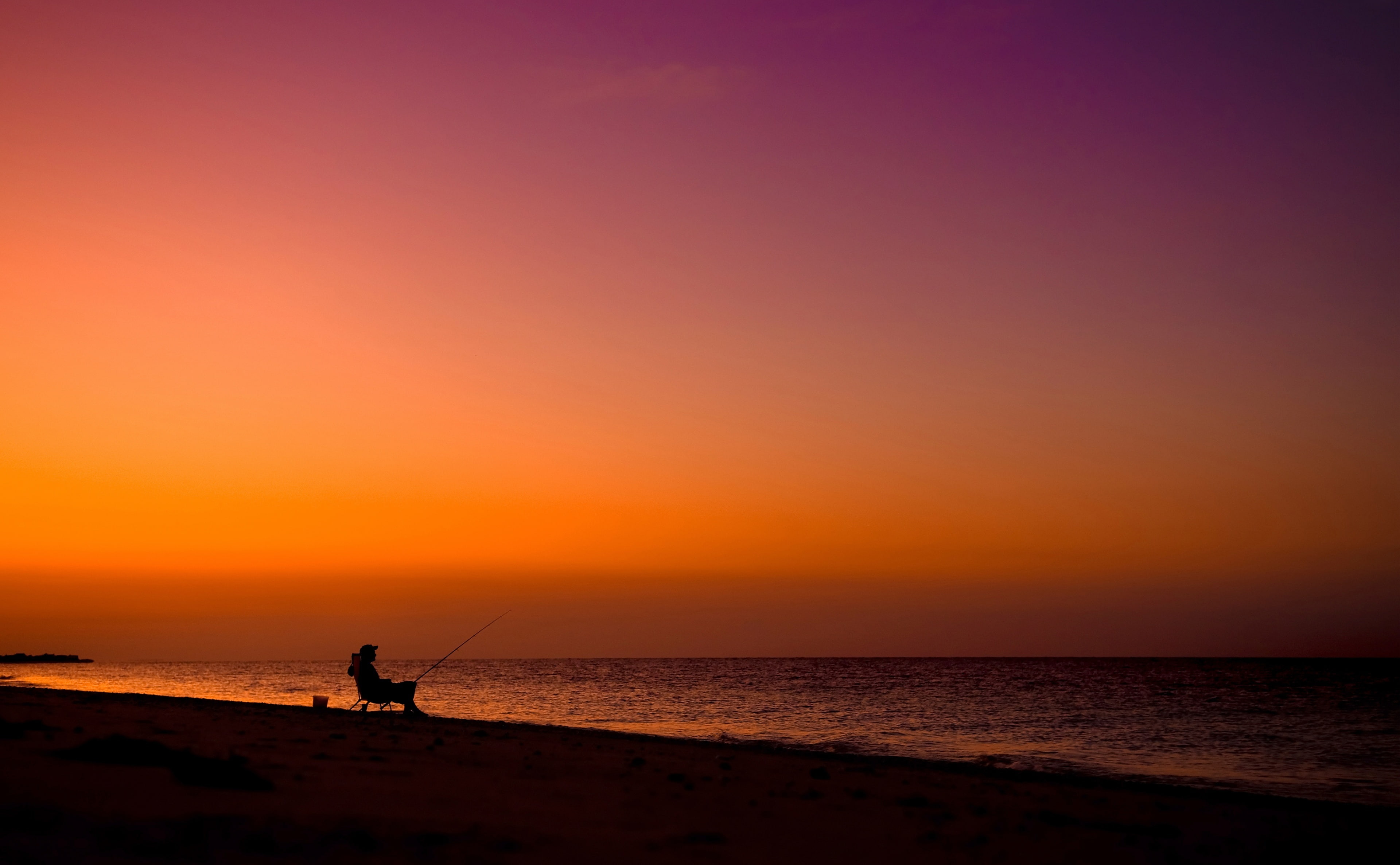 Fisherman Silhouette, silhouette of person sitting on deck chair