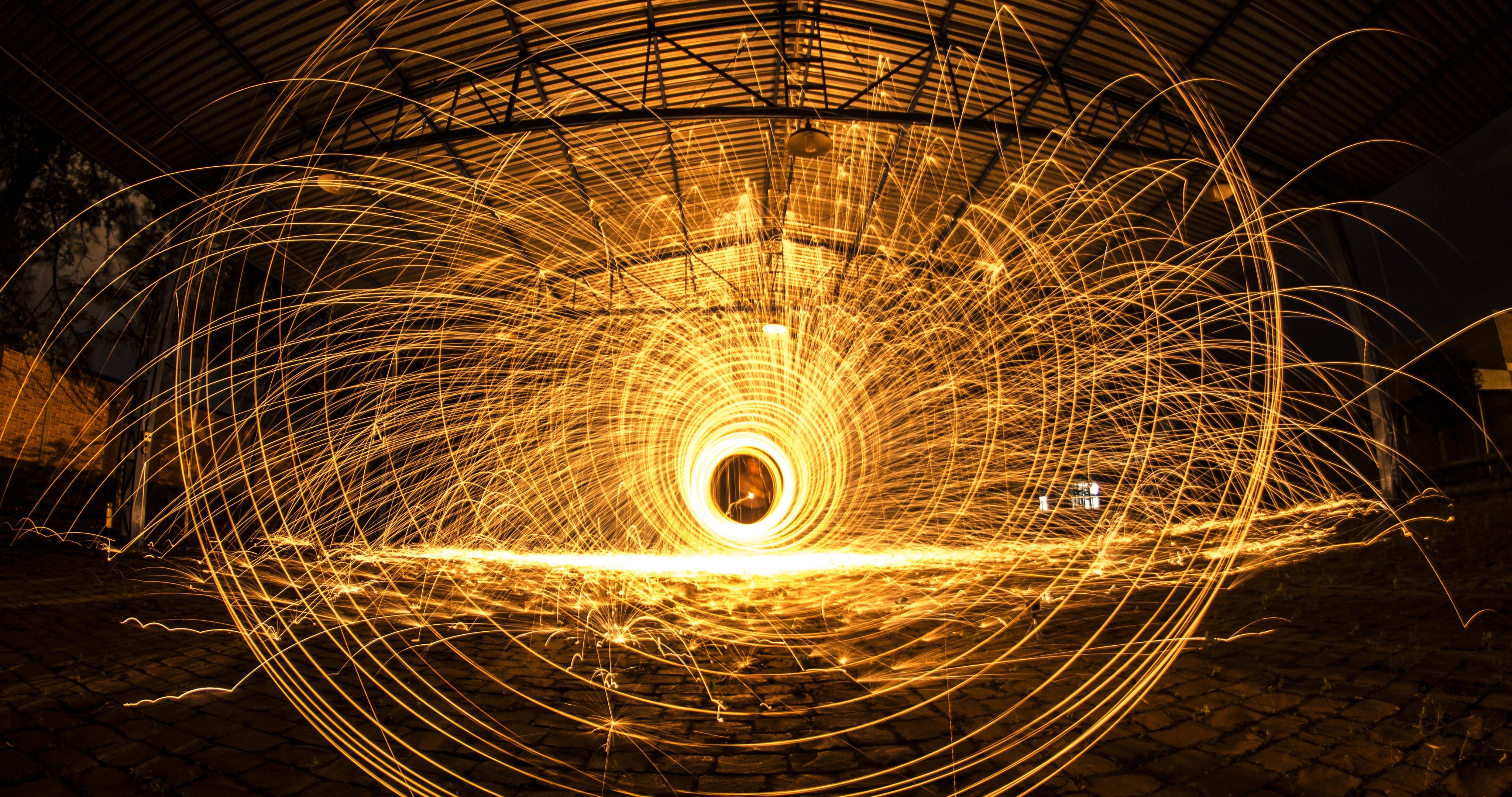 yellow steel wool photo, construction, fire, factory, long exposure