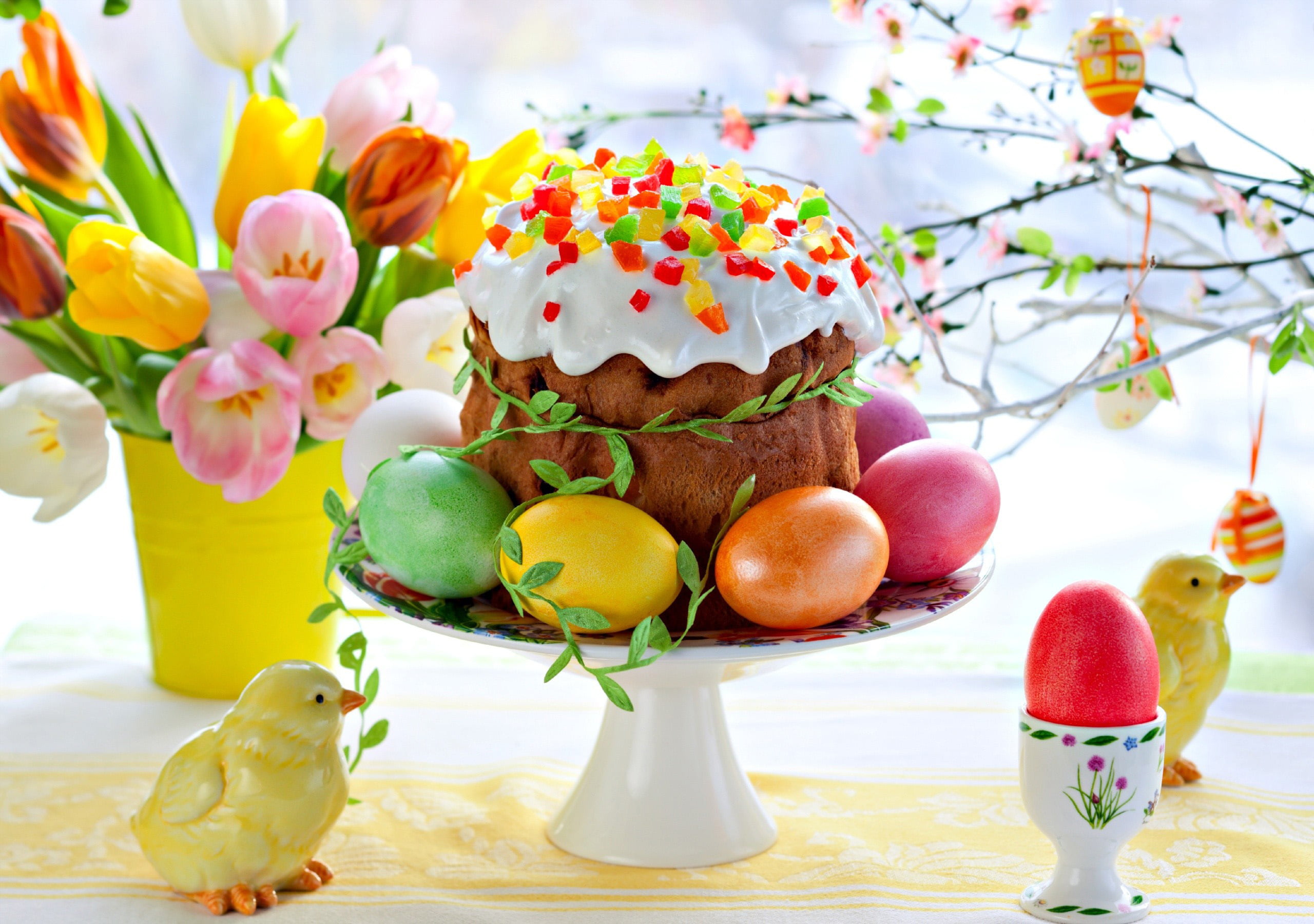 white and brown ceramic cake rack, flowers, Easter, tulips, Easter eggs