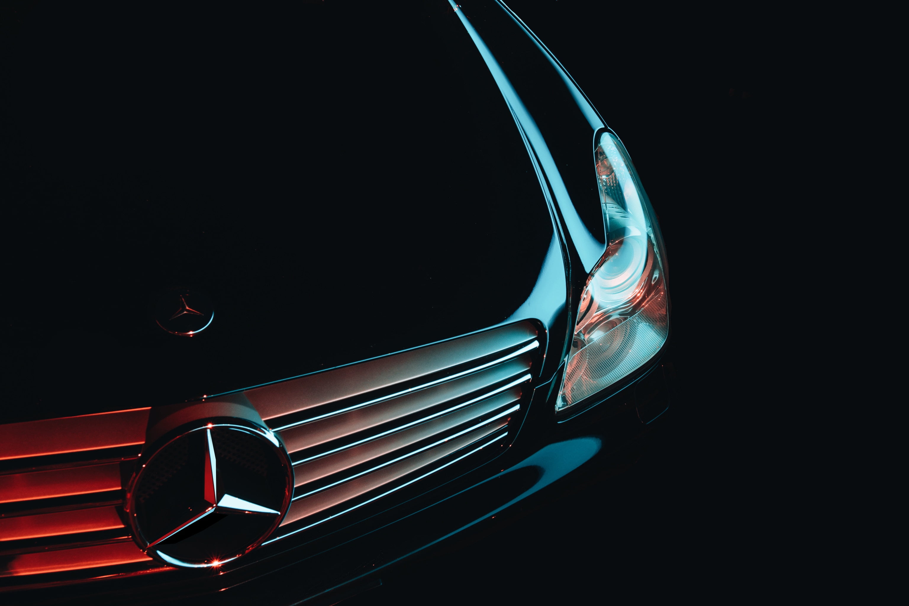 mercedes, front bumper, headlight, no people, close-up, black background