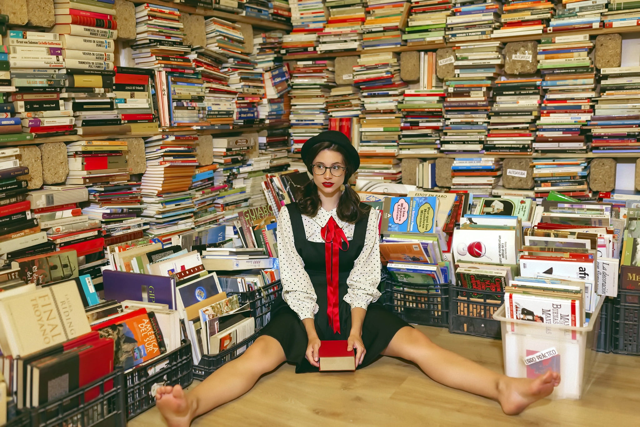 books, women, sitting, on the floor, barefoot, one person, looking at camera
