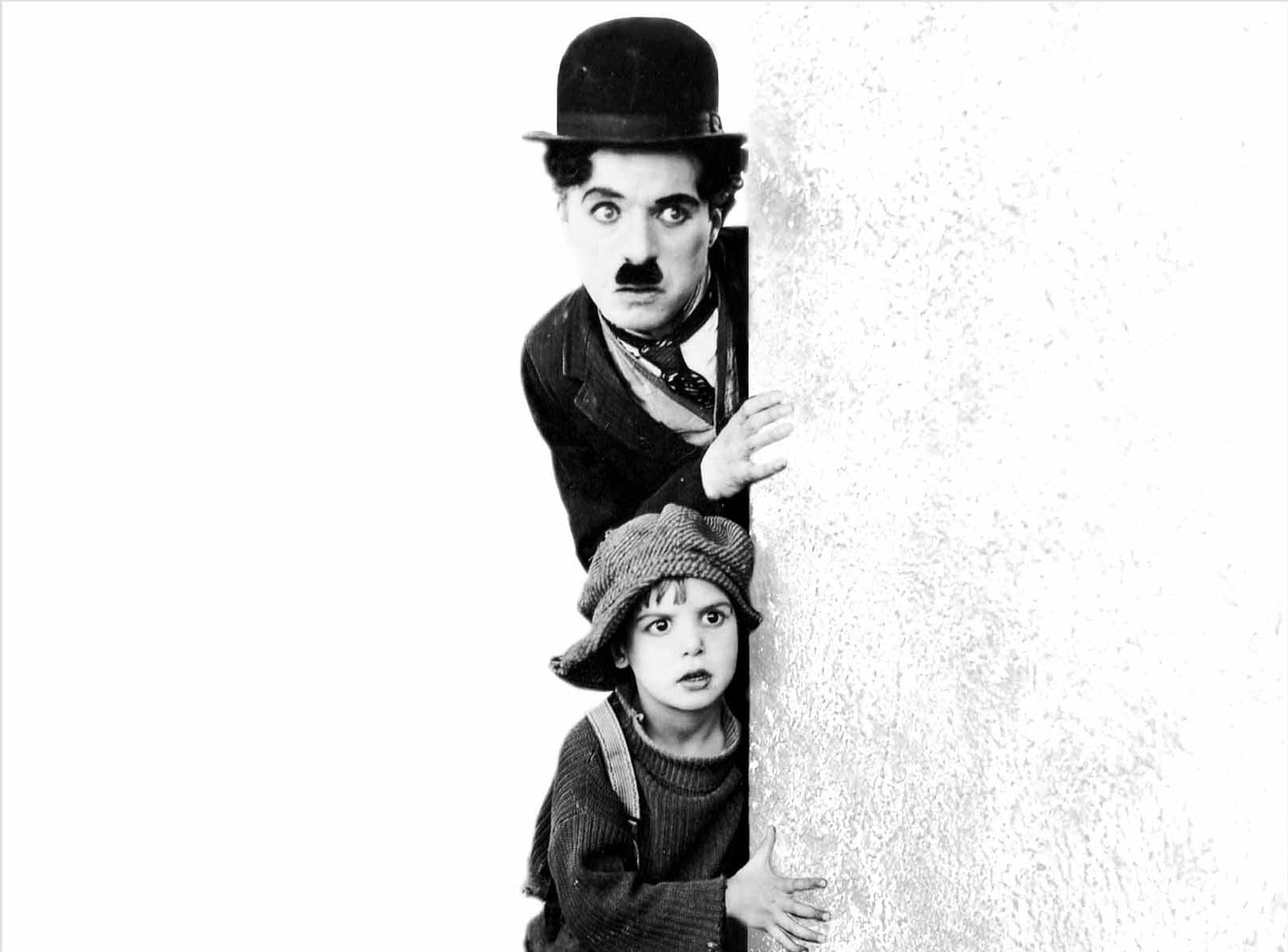 charlie chaplin, portrait, looking at camera, white background
