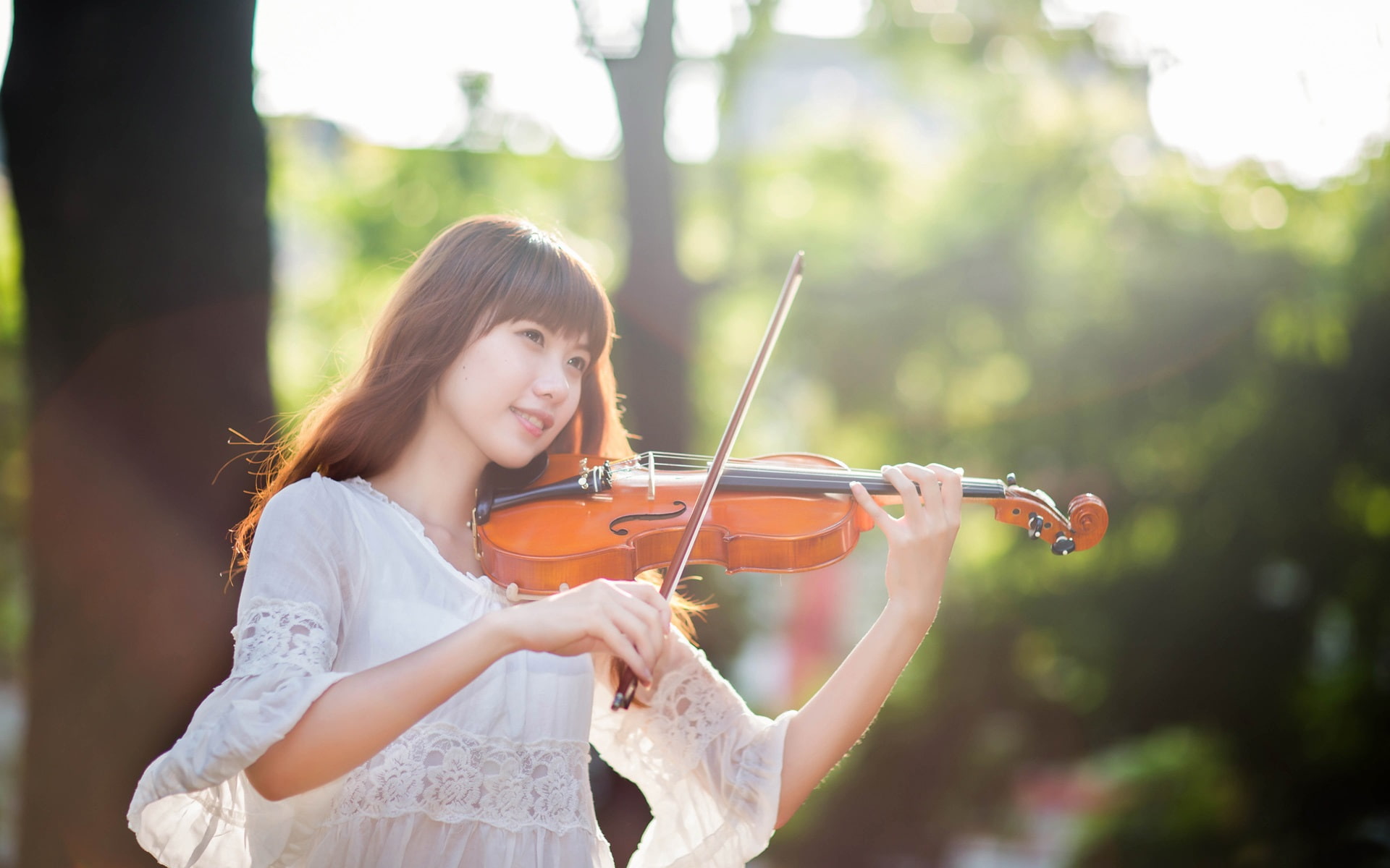 Violinist, east girl, forest, sunlight
