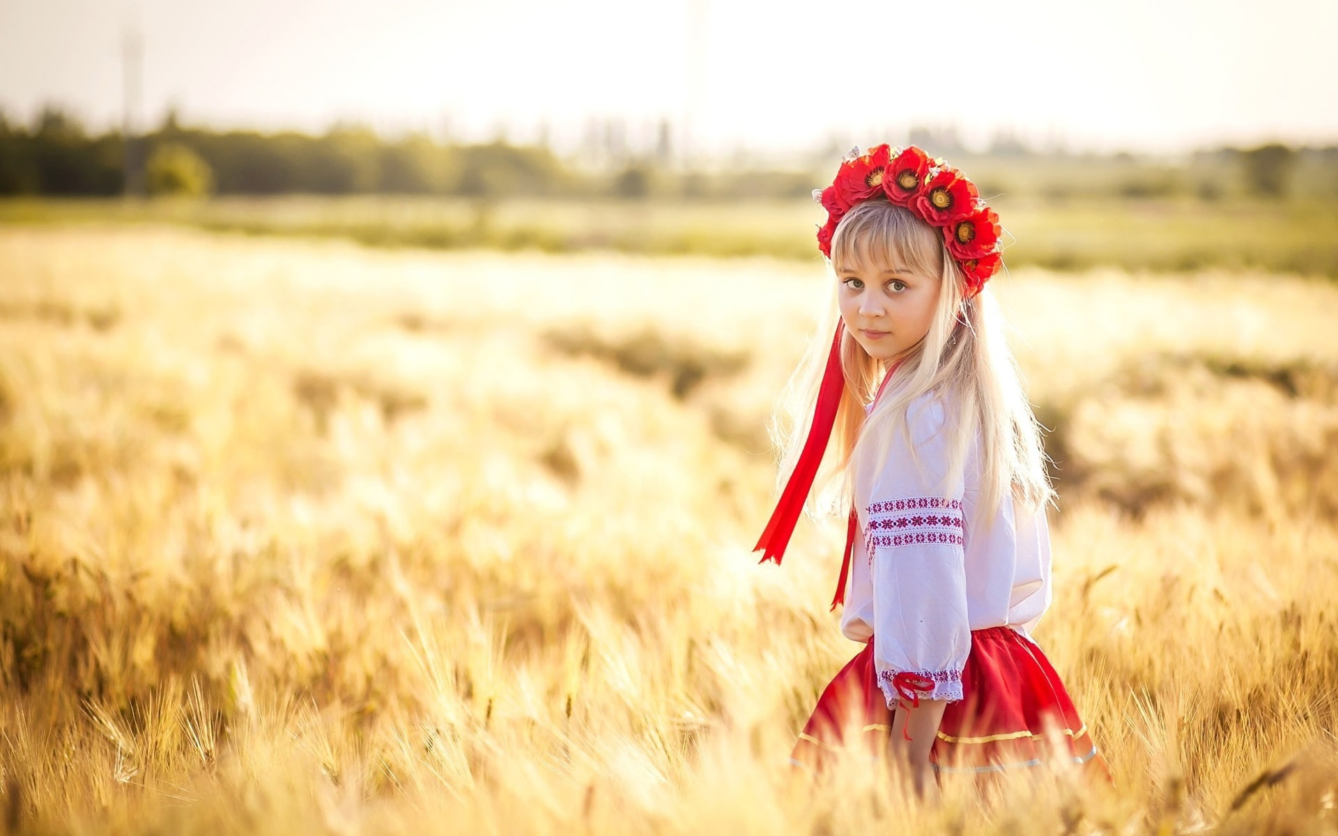 Ukraine, cute little girl, wheat field