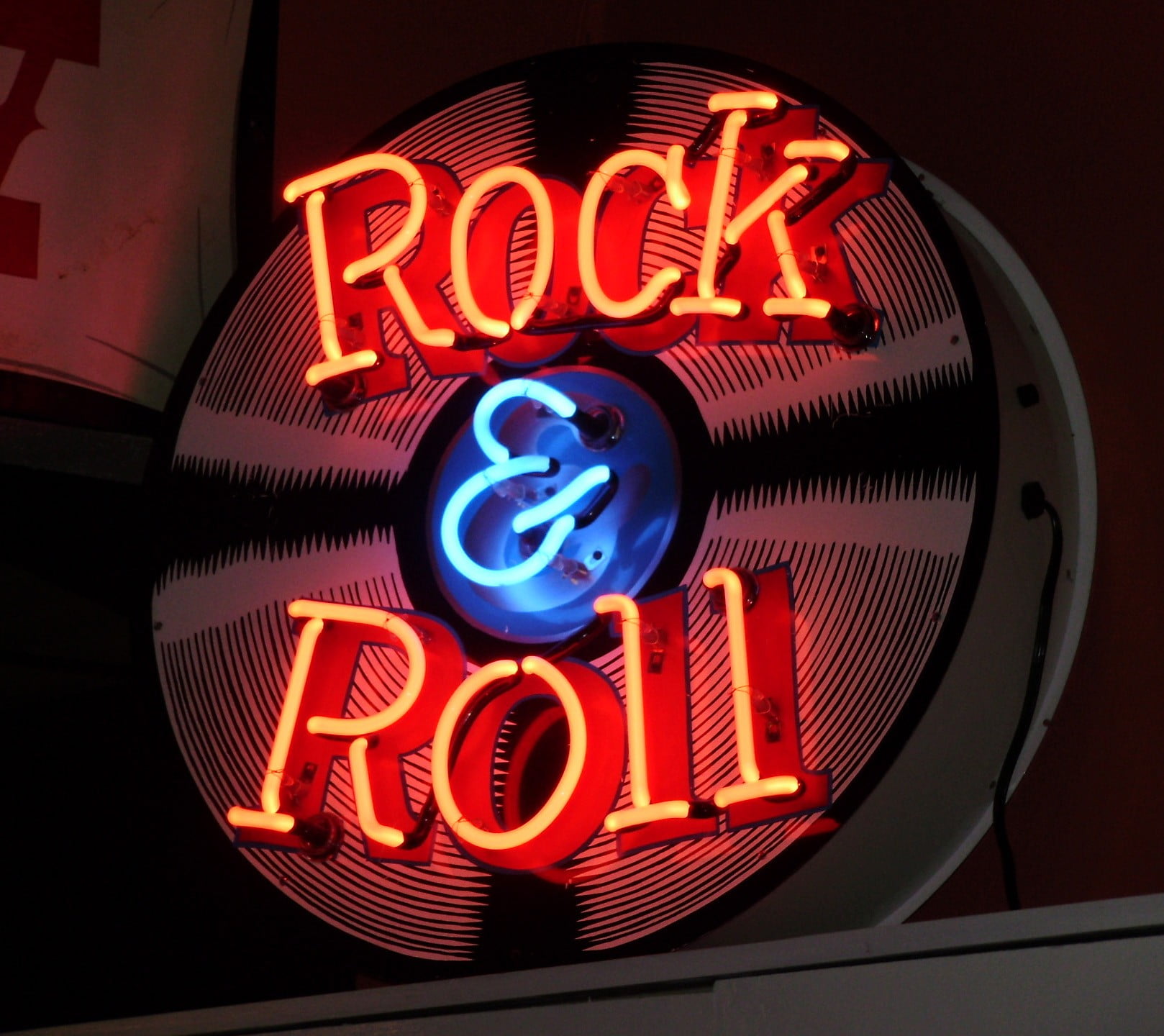 red rock & roll neon light signage, rock & roll, indoors